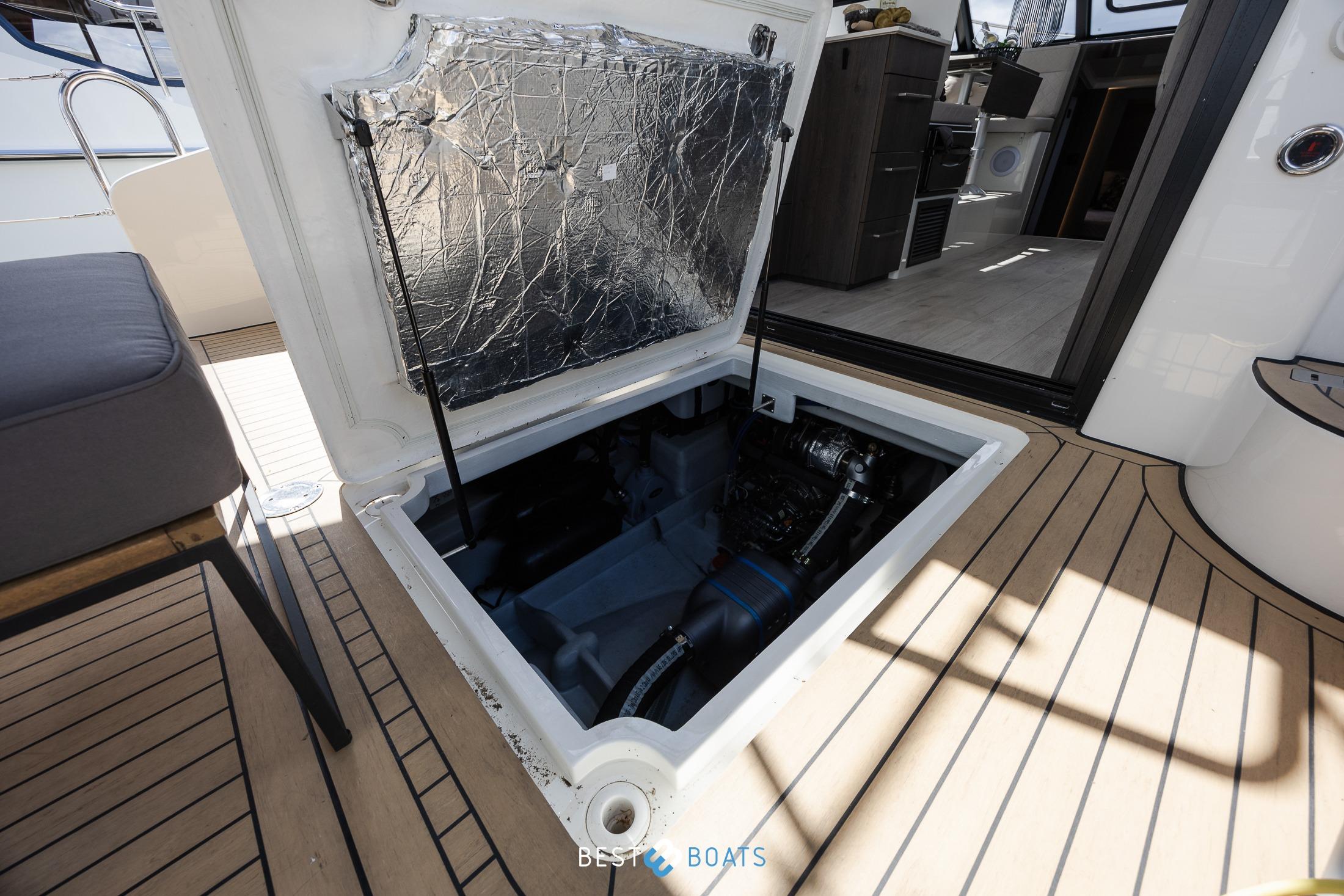 Engine compartment of 2023 Cobra Yachts Futura 36 Premium Fly, open hatch view.