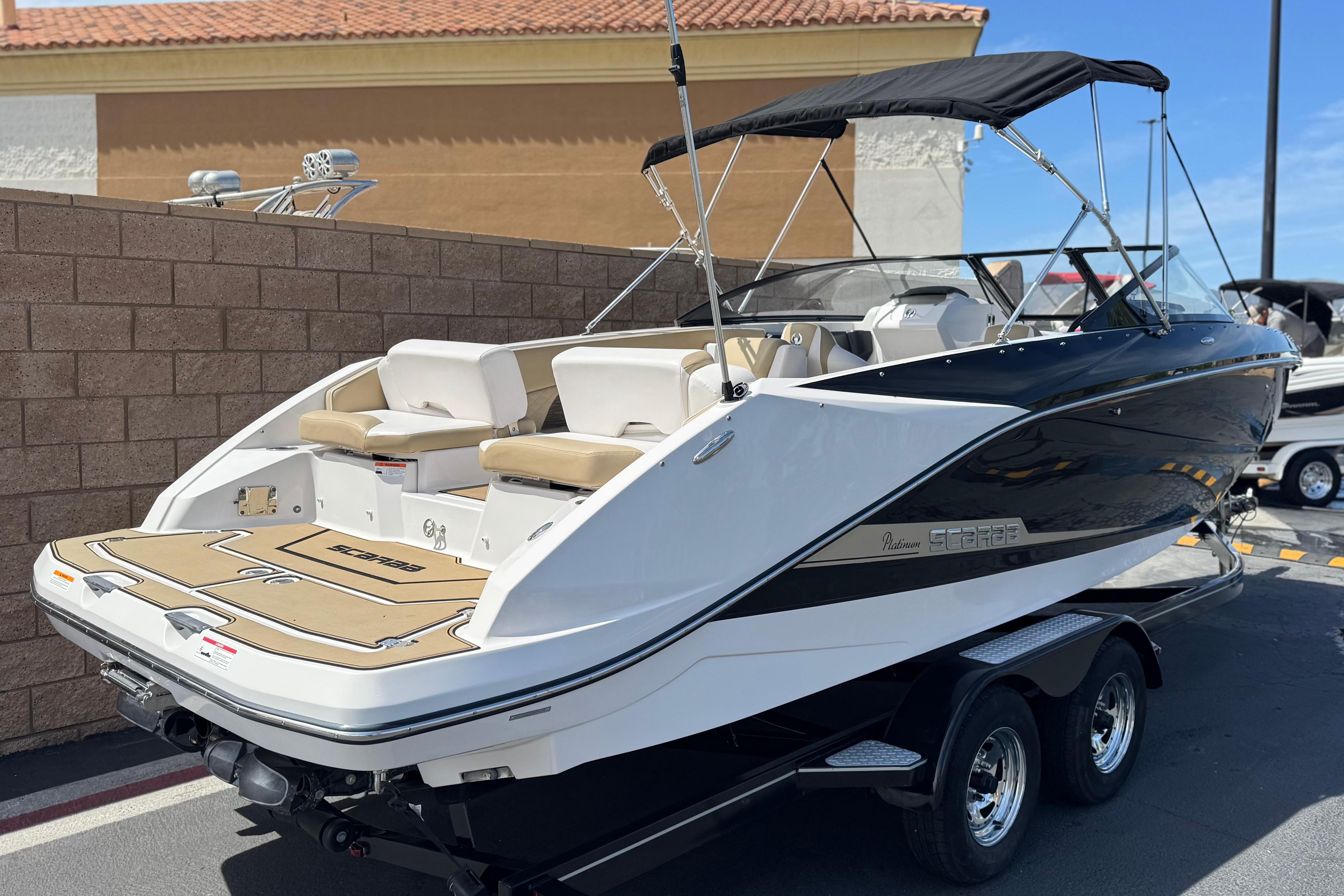 2017 Scarab 255 H.O. Platinum boat with sleek design and spacious seating.