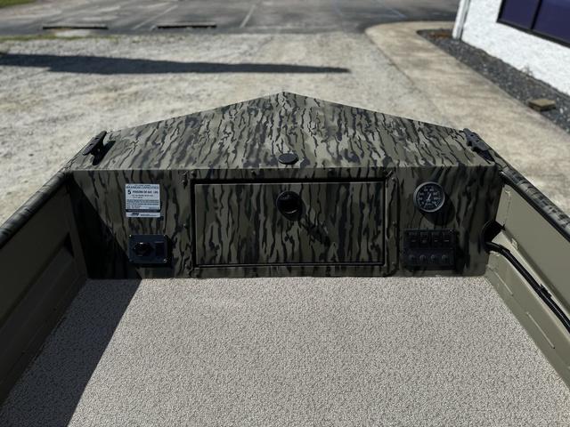 2024 SeaArk 31652 CRAPPIE boat interior with camouflage design and control panel.