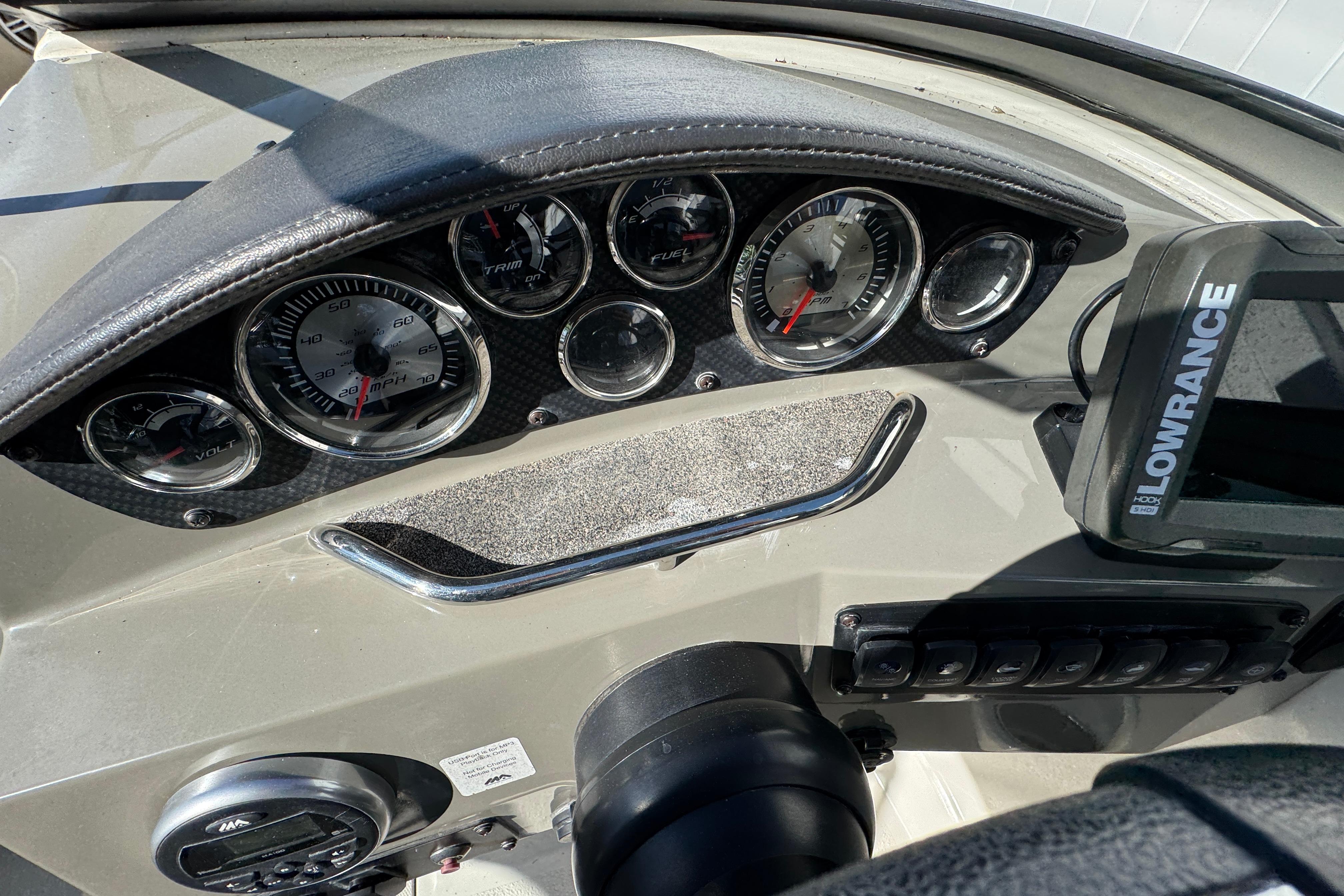 Dashboard of a 2018 Stingray 204 LR boat with gauges and Lowrance device.
