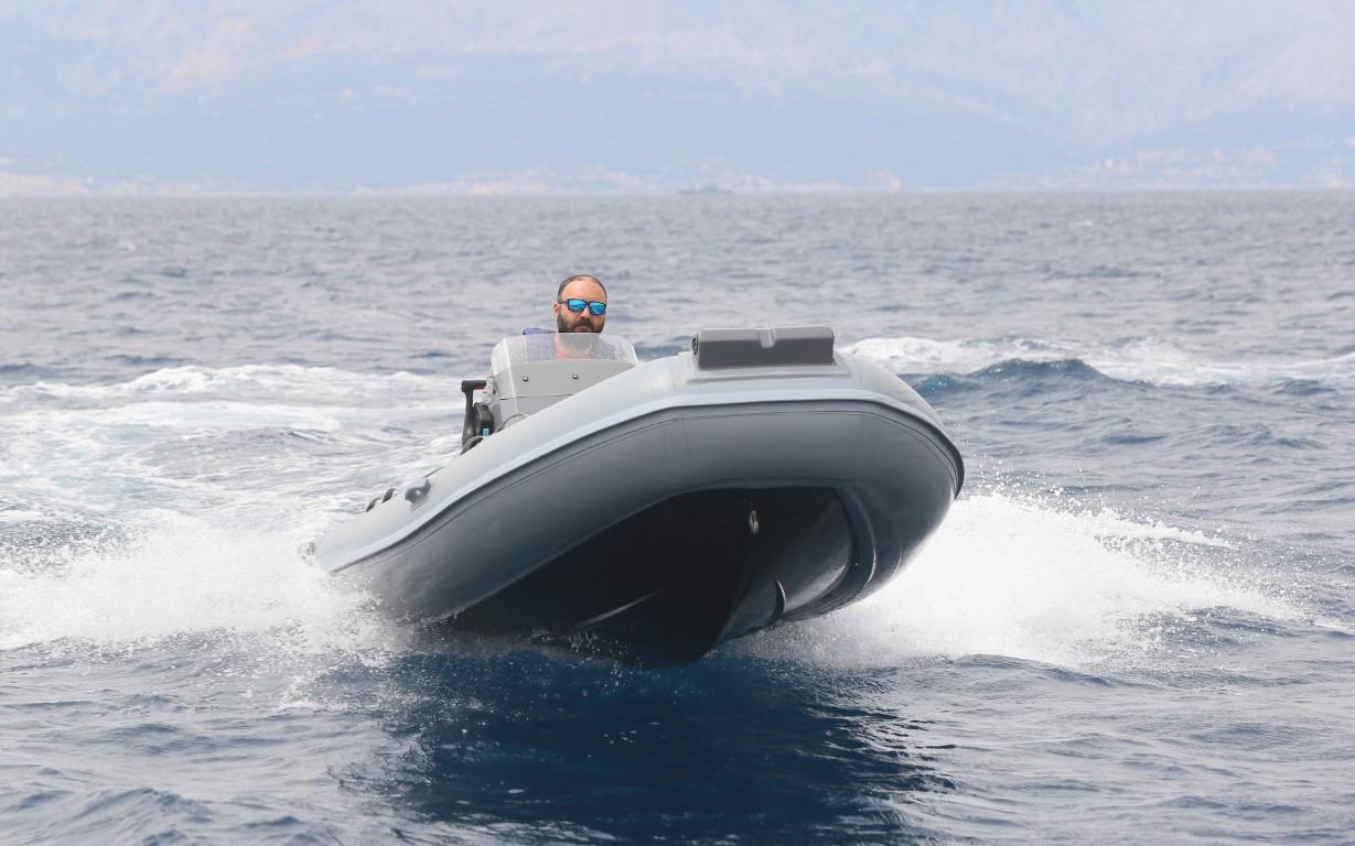 2024 Northstar Axis 4.2 inflatable boat cruising on open water.