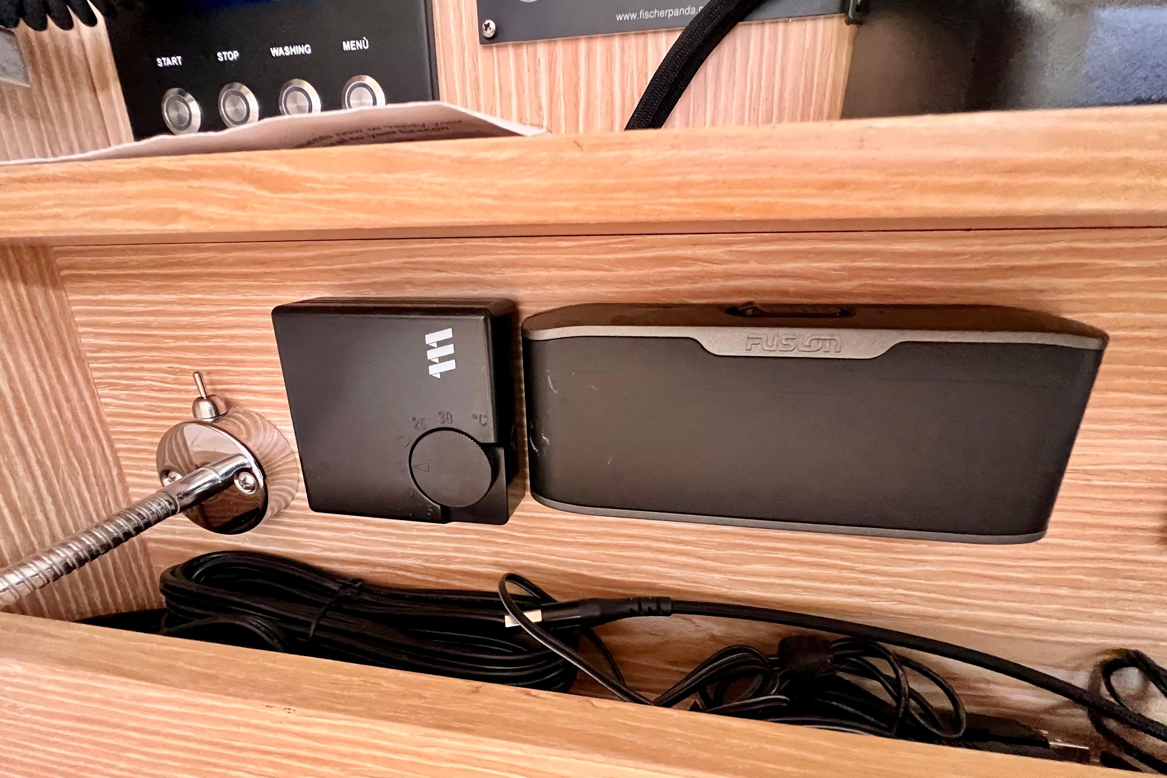 Control panel and devices inside a 2016 Hanse 455 yacht cabin.