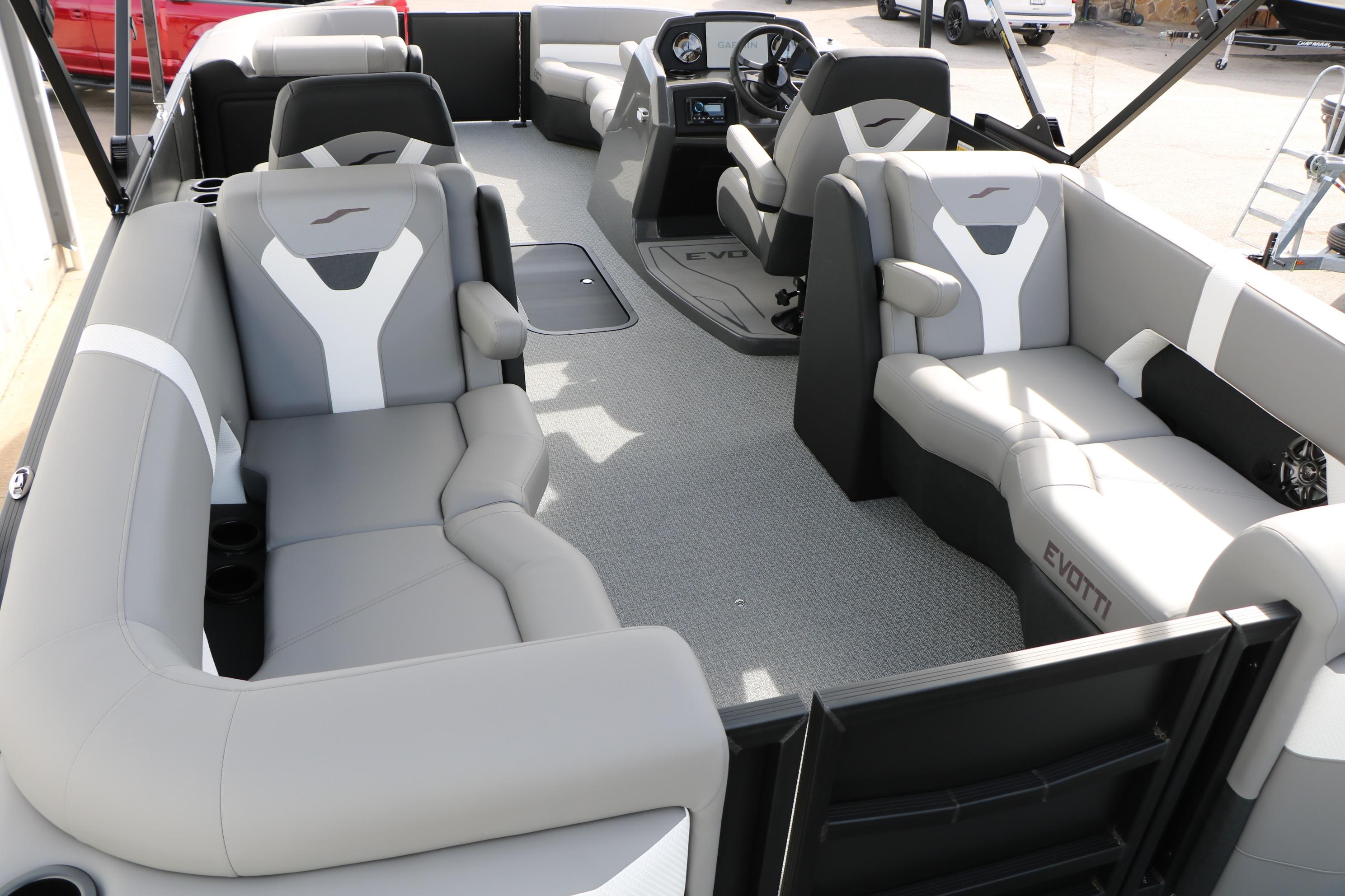 Luxurious interior of 2026 Evotti 521QL pontoon boat with plush seating and modern design.