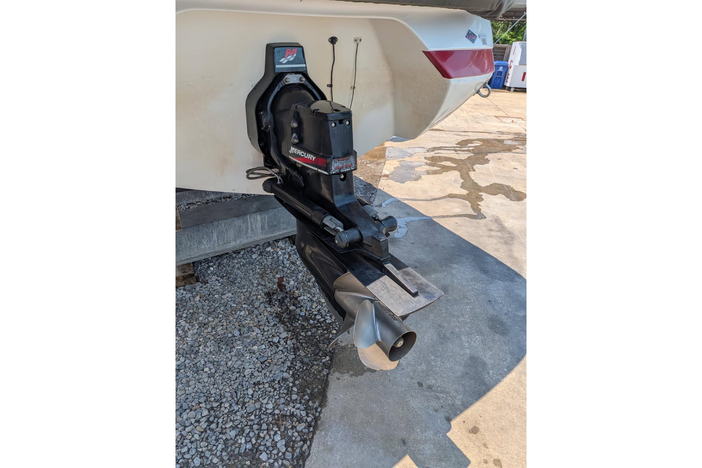 Rear view of a 2020 Cobalt 206 boat with Mercury outboard motor.