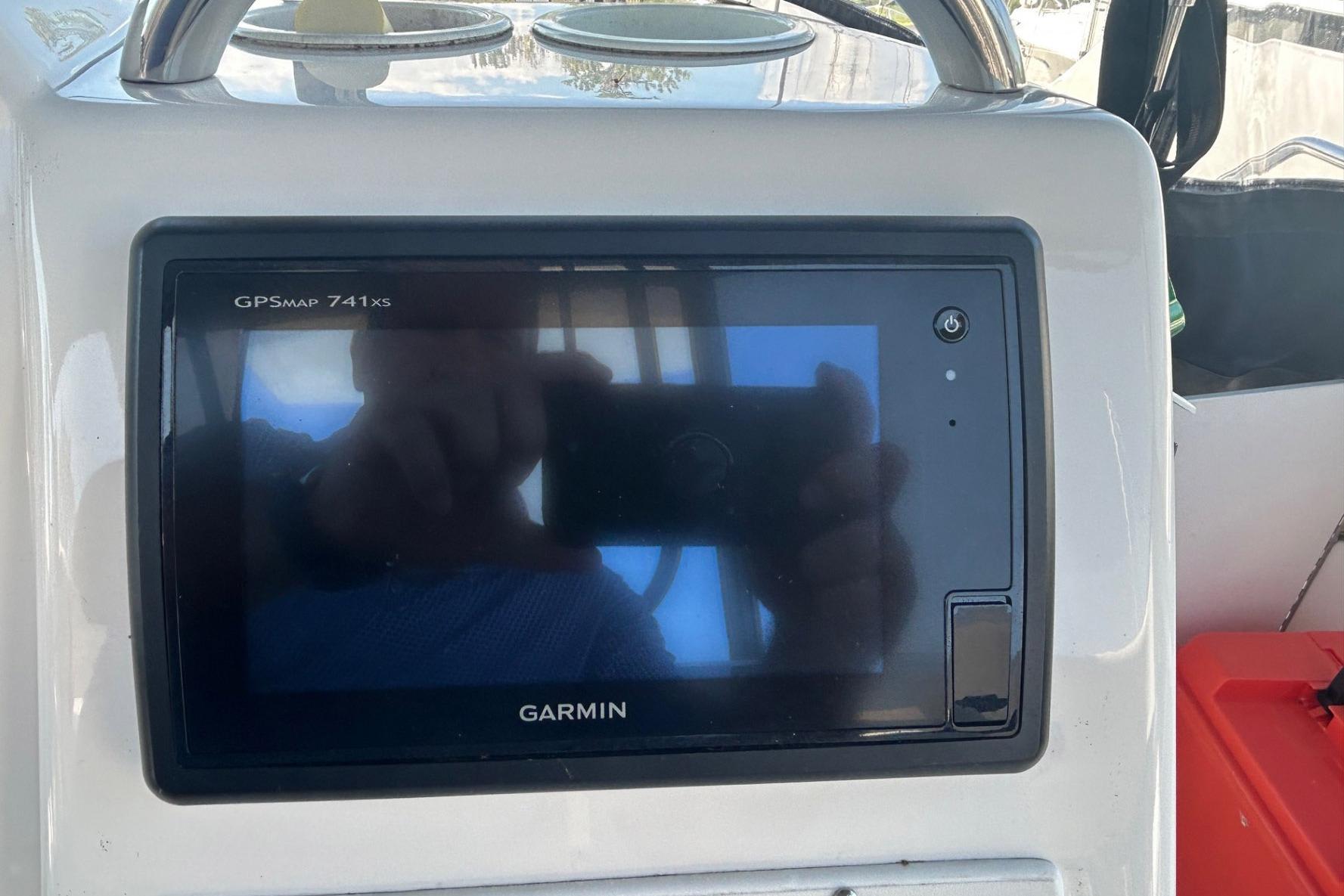 Garmin GPSMAP 741xs on 2000 Silverton 352 Motor Yacht dashboard.