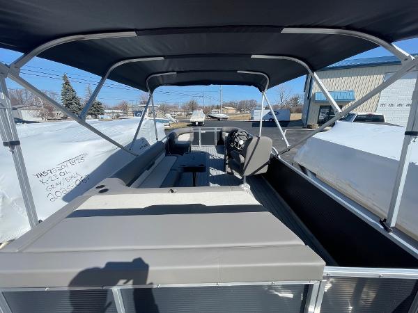 Interior view of 2025 Armada Saphir 23CR boat with seating and canopy.