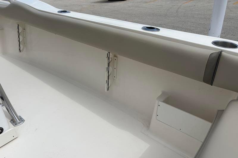 2024 Key West 239 FS boat interior detail with rod holders and cup holders.