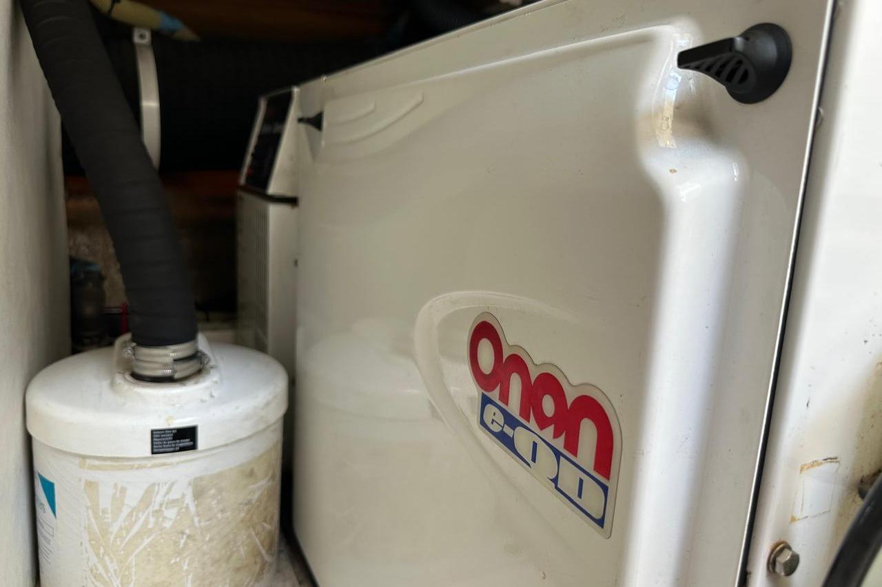 Onan generator in a 2007 Princess 50 yacht engine room.