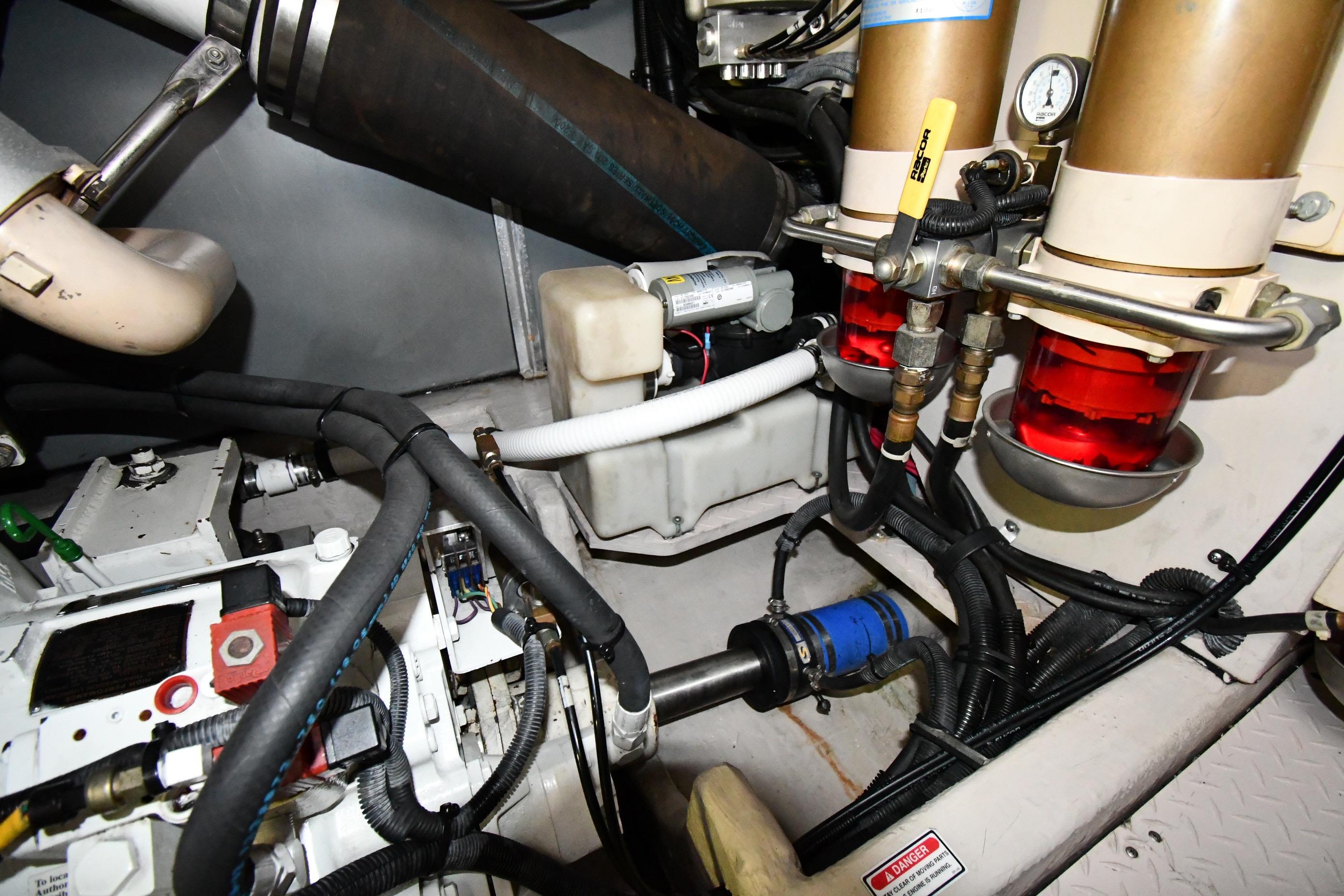 Engine room of 2001 Sea Ray 540 Sundancer with visible components and wiring.