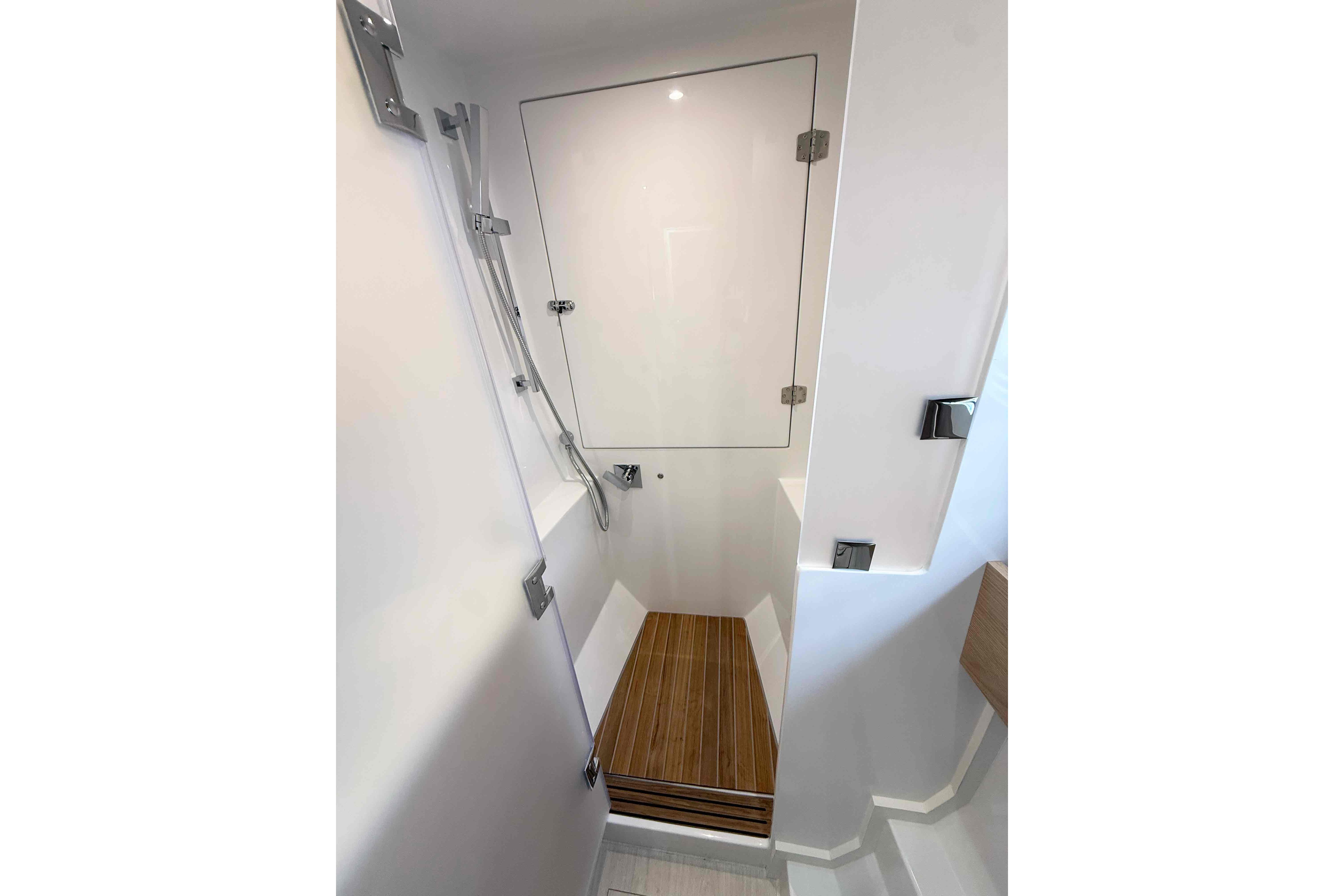 Modern shower area in 2026 Aventura 37 Explorer Trawler with wooden flooring.