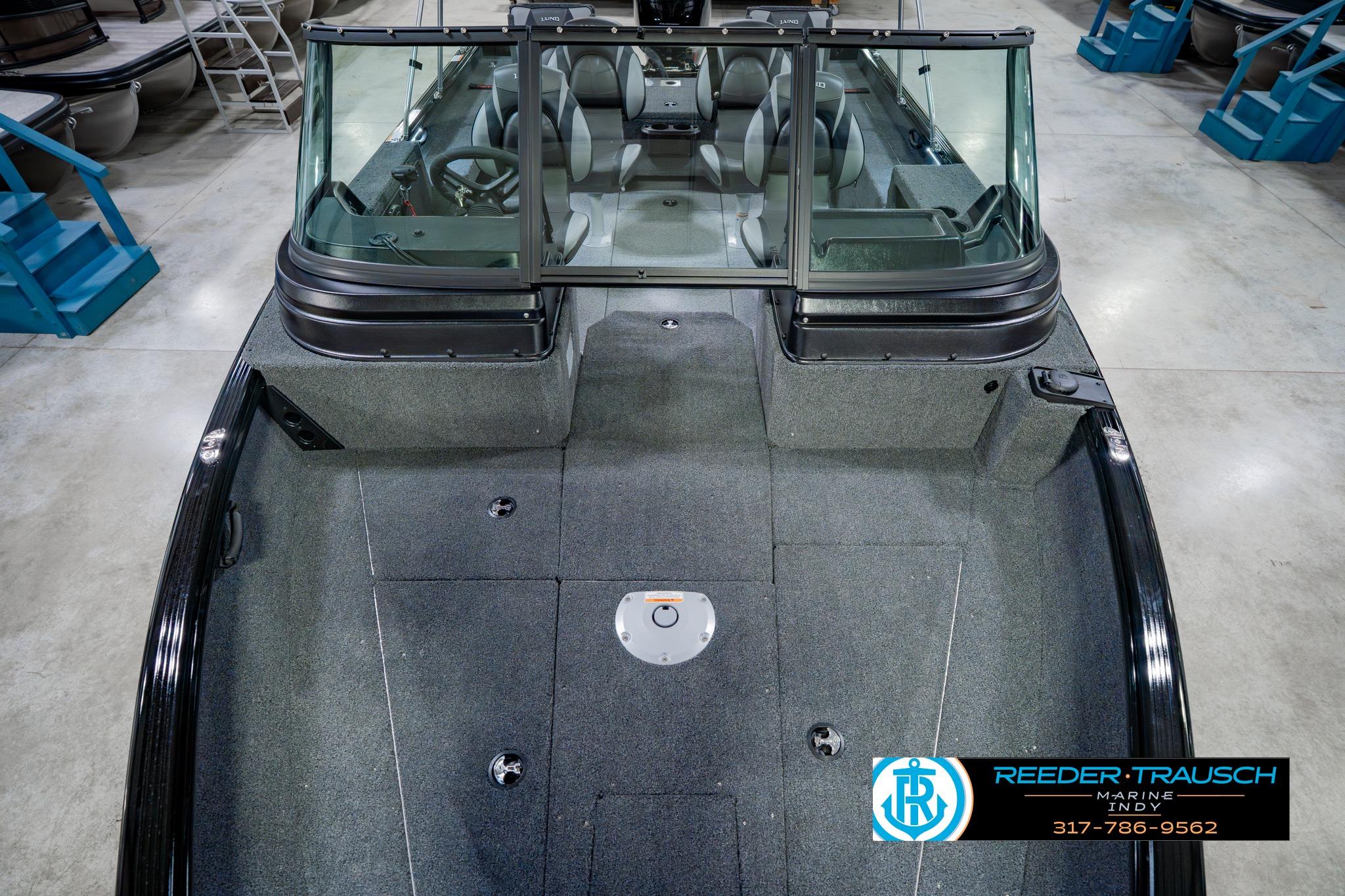 2026 Lund 1875 Impact XS boat interior with spacious seating and modern design.