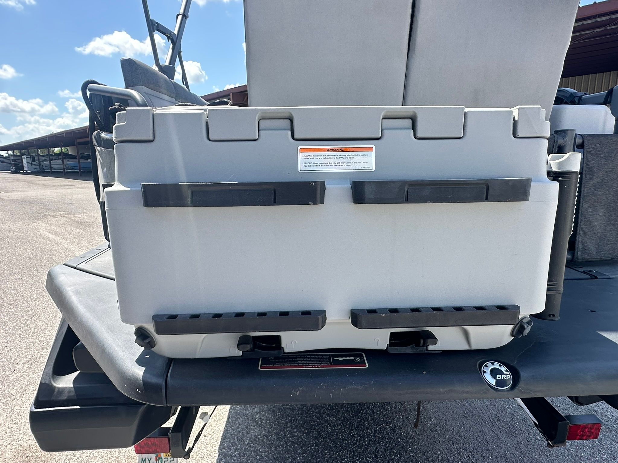A cooler is mounted on the rear of a Sea-Doo 21 SWITCH SPORT.