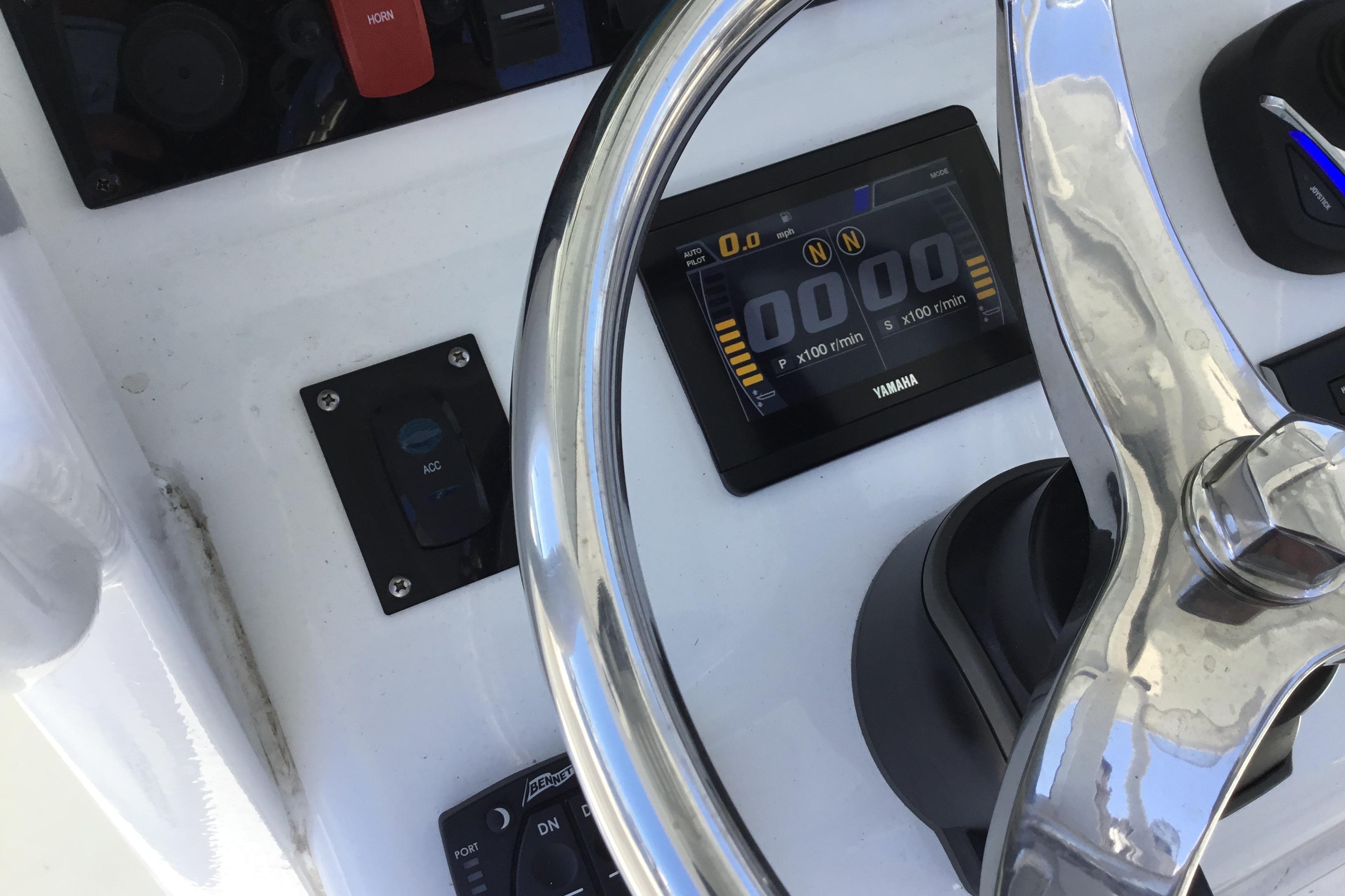 Steering console of 2024 Sea Hunt Gamefish 28 Coffin Box with Yamaha display.