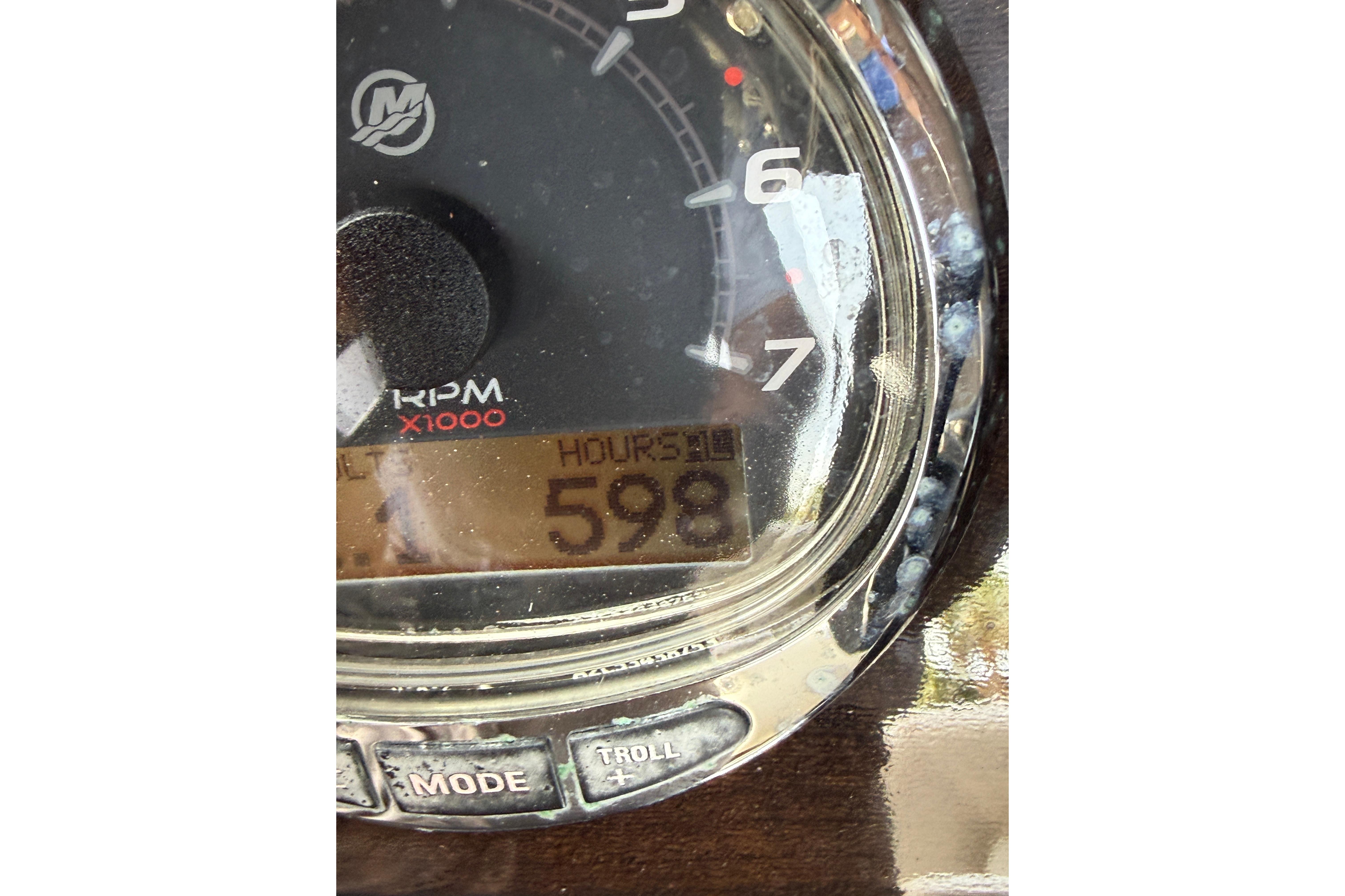 Close-up of Blackwood 27 tachometer showing 598 hours, RPM gauge visible.