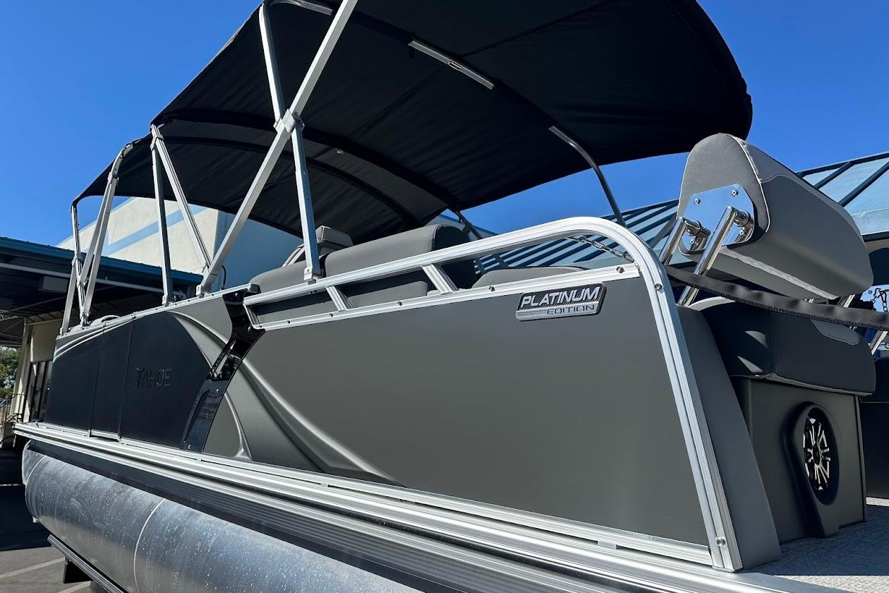 2026 Tahoe Pontoon LTZ Quad Lounger Shift 23, Platinum Edition, under a sunny sky.