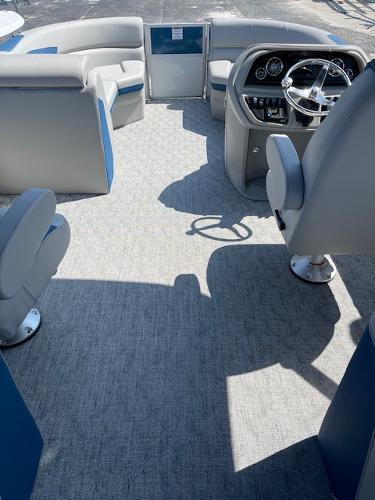 2025 Berkshire 22 RFX LE Tri-toon Pontoon interior with modern seating and steering console.