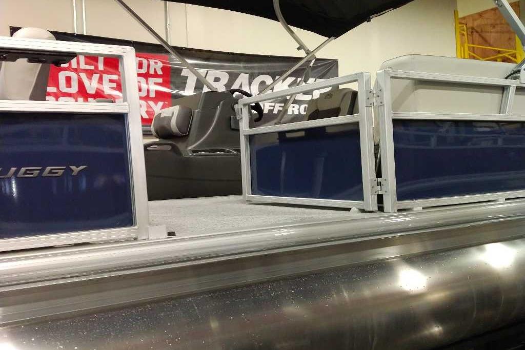 2026 Sun Tracker Bass Buggy 18 DLX pontoon boat interior with open gates.