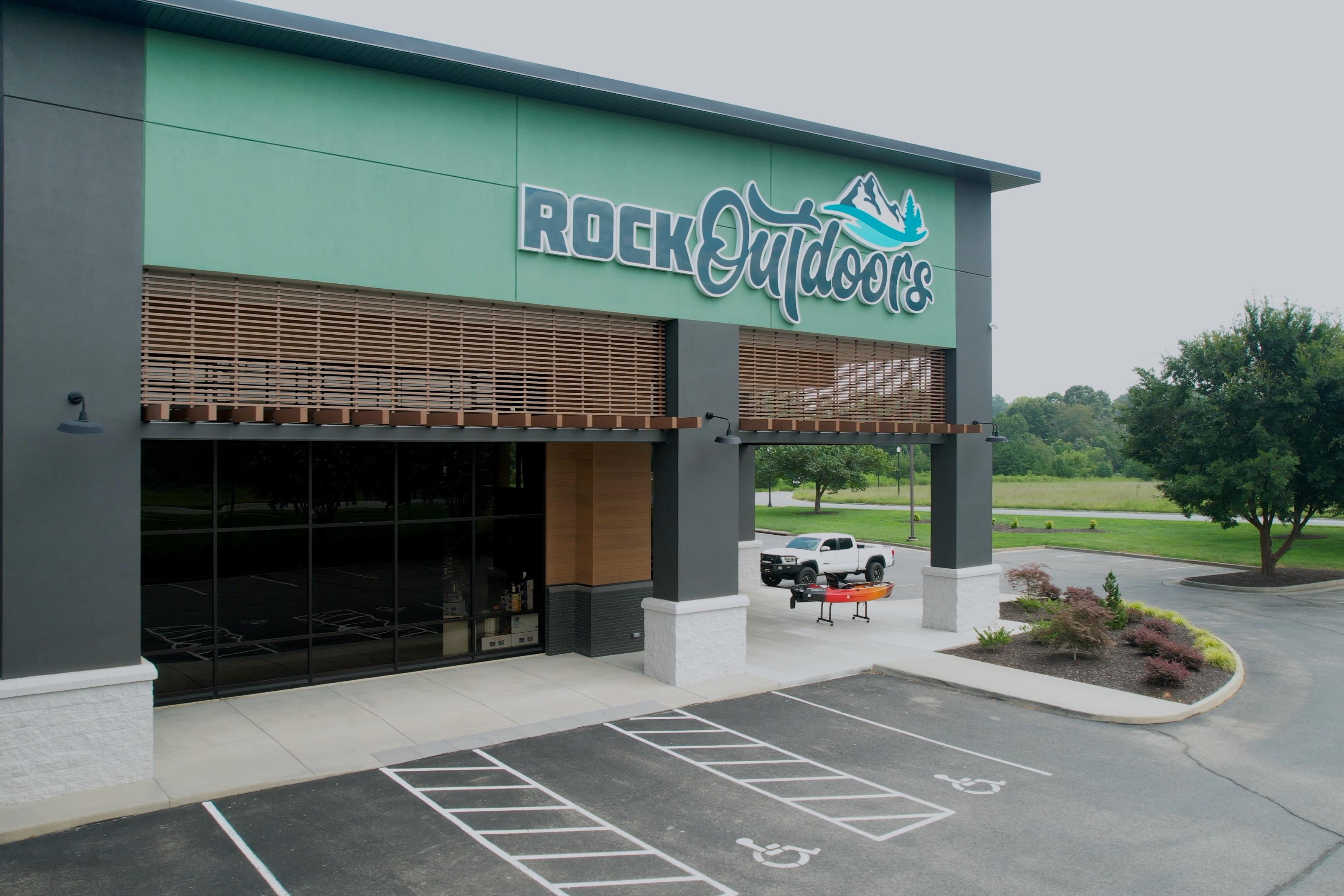 Outdoor store entrance with parking lot, featuring a Phoenix 819 ZXL, 2026 model.
