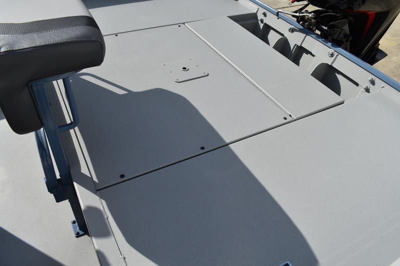 2026 Lowe Roughneck RX2070 CC boat deck with seating and storage compartments.