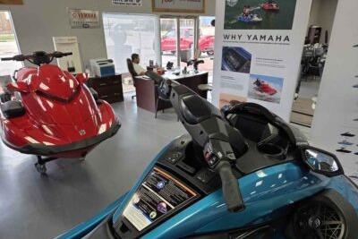 2026 Yamaha WaveRunner FX Cruiser SVHO displayed in showroom with promotional materials.