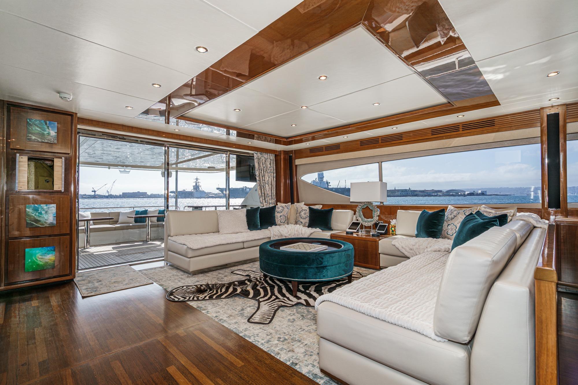 Luxurious interior of 2011 Princess 95 Motor Yacht with elegant seating and ocean view.