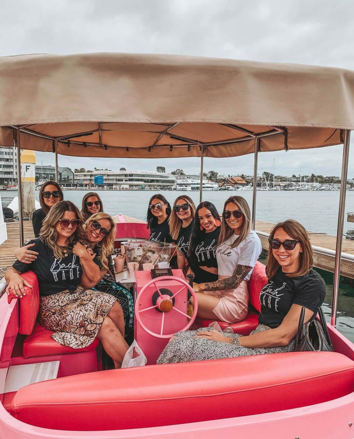 Group of women enjoying a ride on a 2023 Vision Marine Technologies Fantail 217 boat.