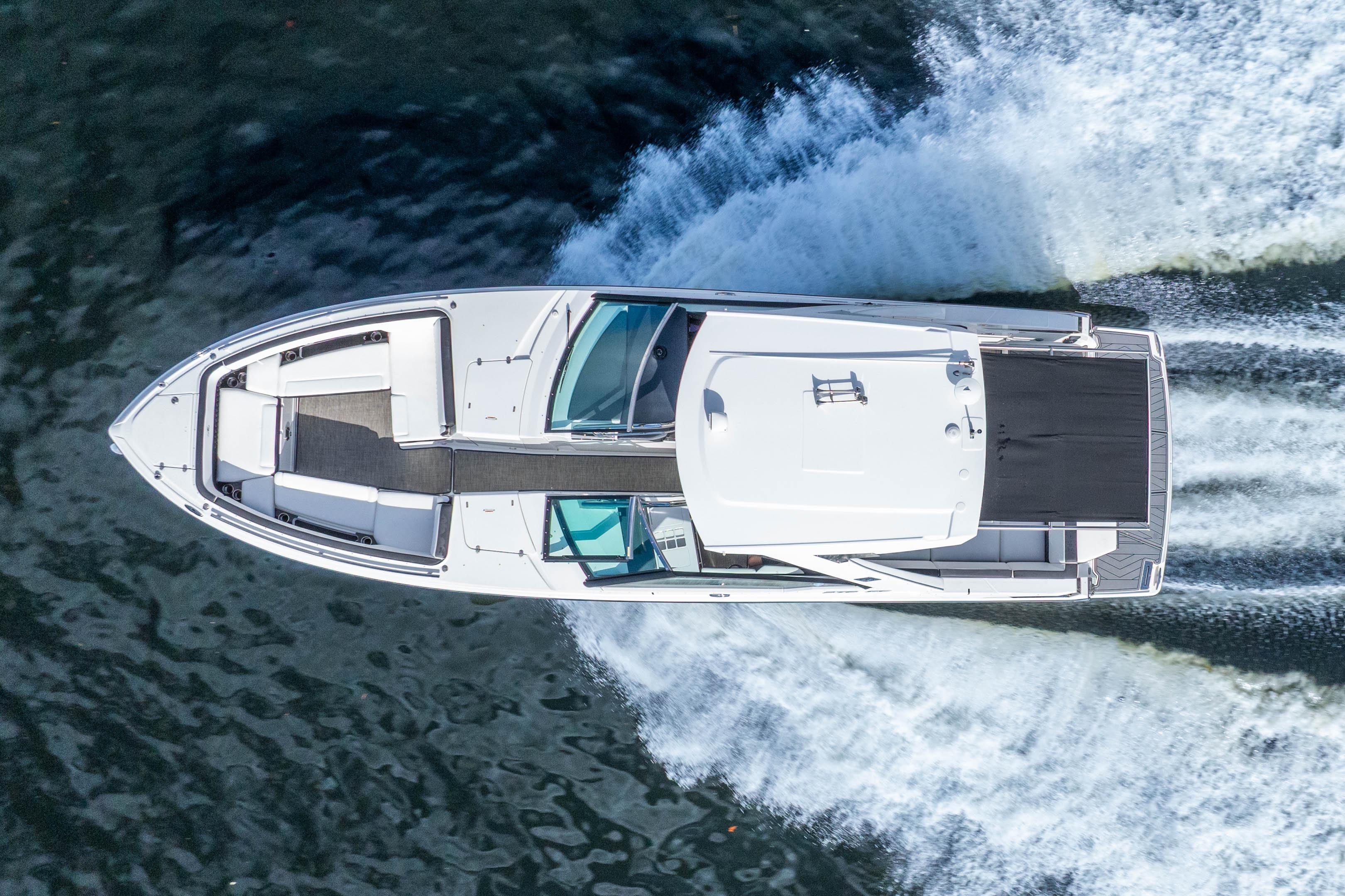 Aerial view of 2022 Monterey 378SS Super Sport boat cruising on water.