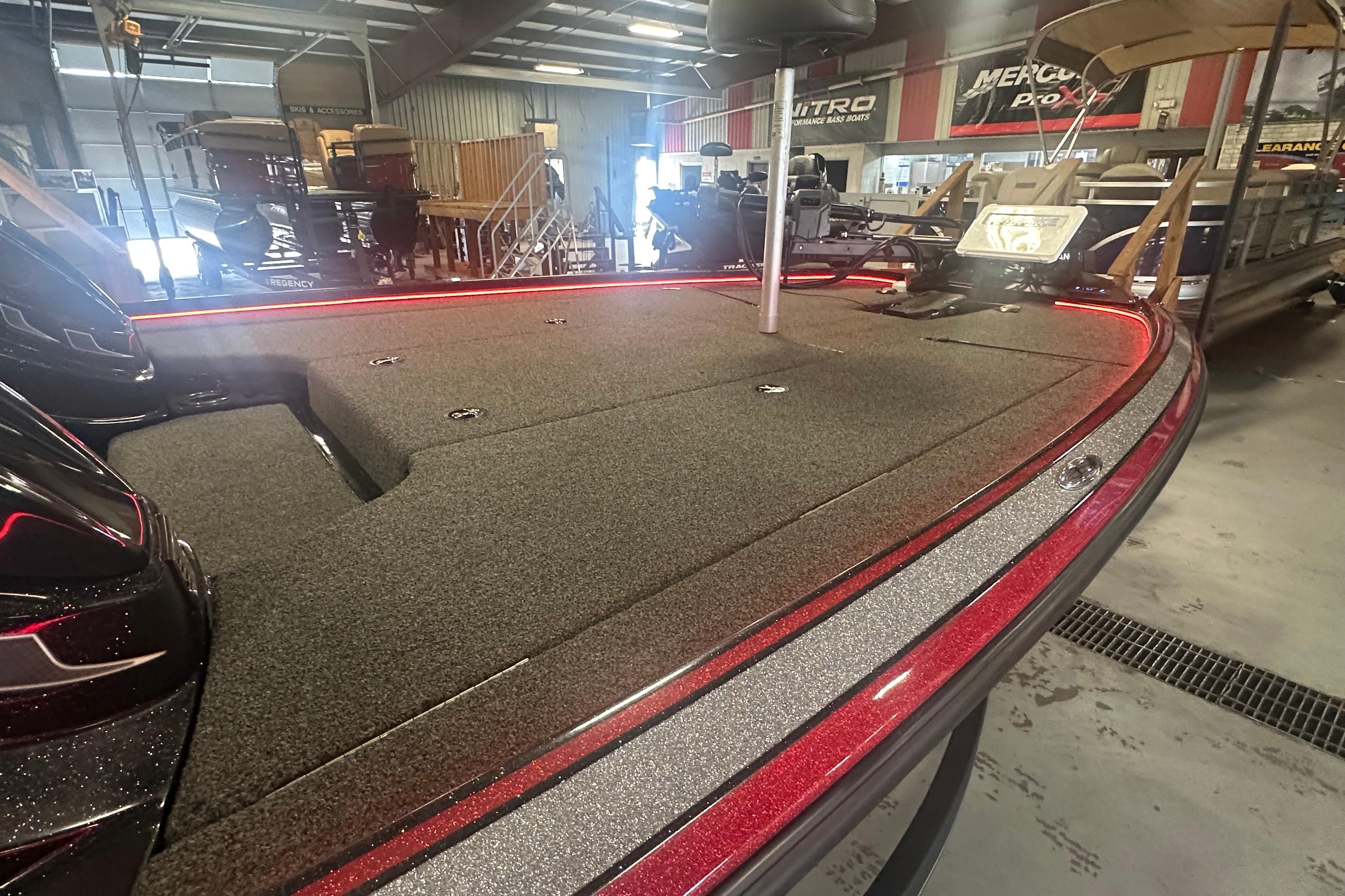 2022 Nitro Z20 Pro boat interior with red trim in showroom.