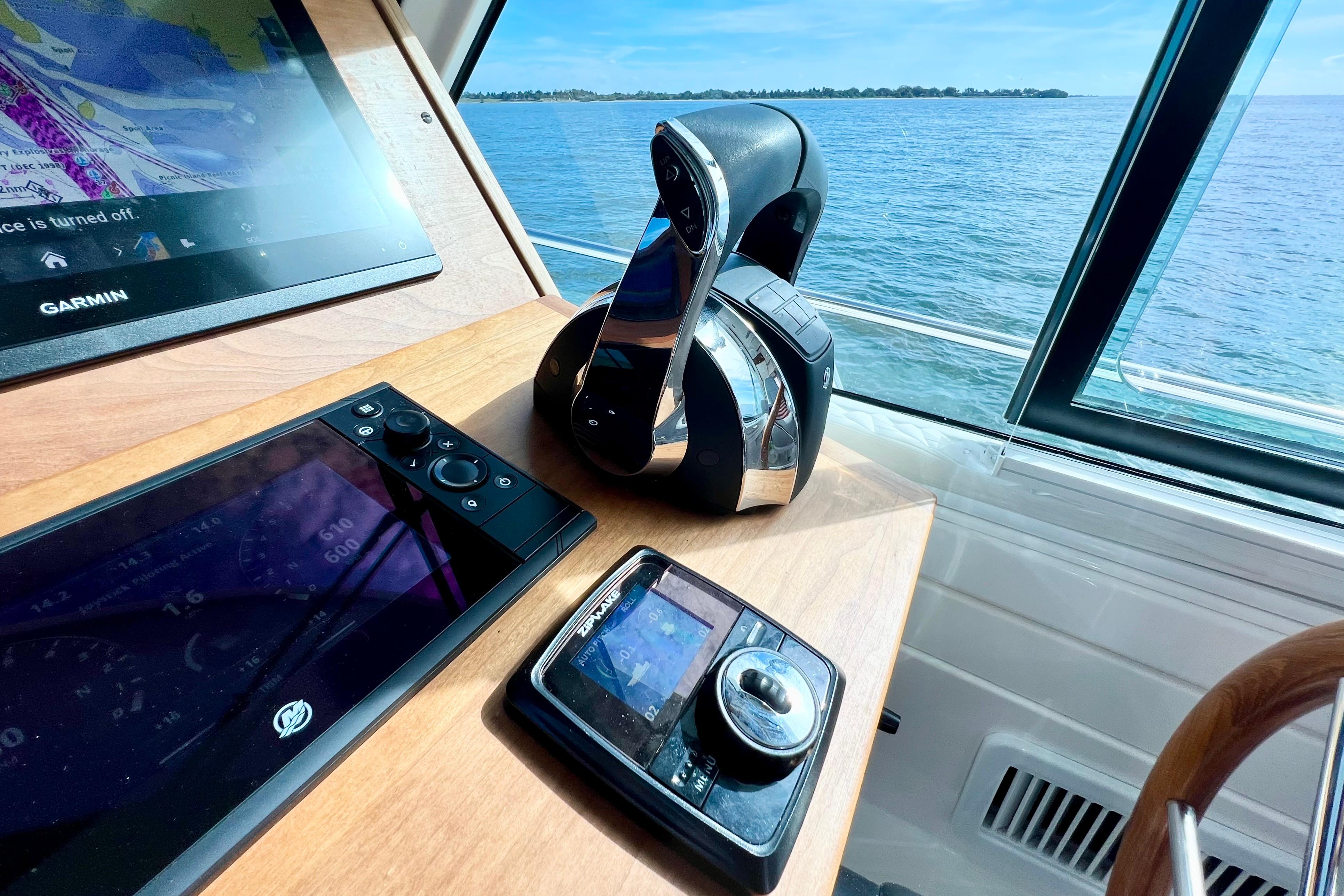 2021 Back Cove 390 helm with Garmin navigation, joystick control, and ocean view.