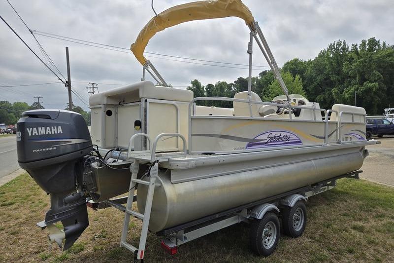 2008 Sweetwater 2386RE pontoon boat with Yamaha motor on trailer.