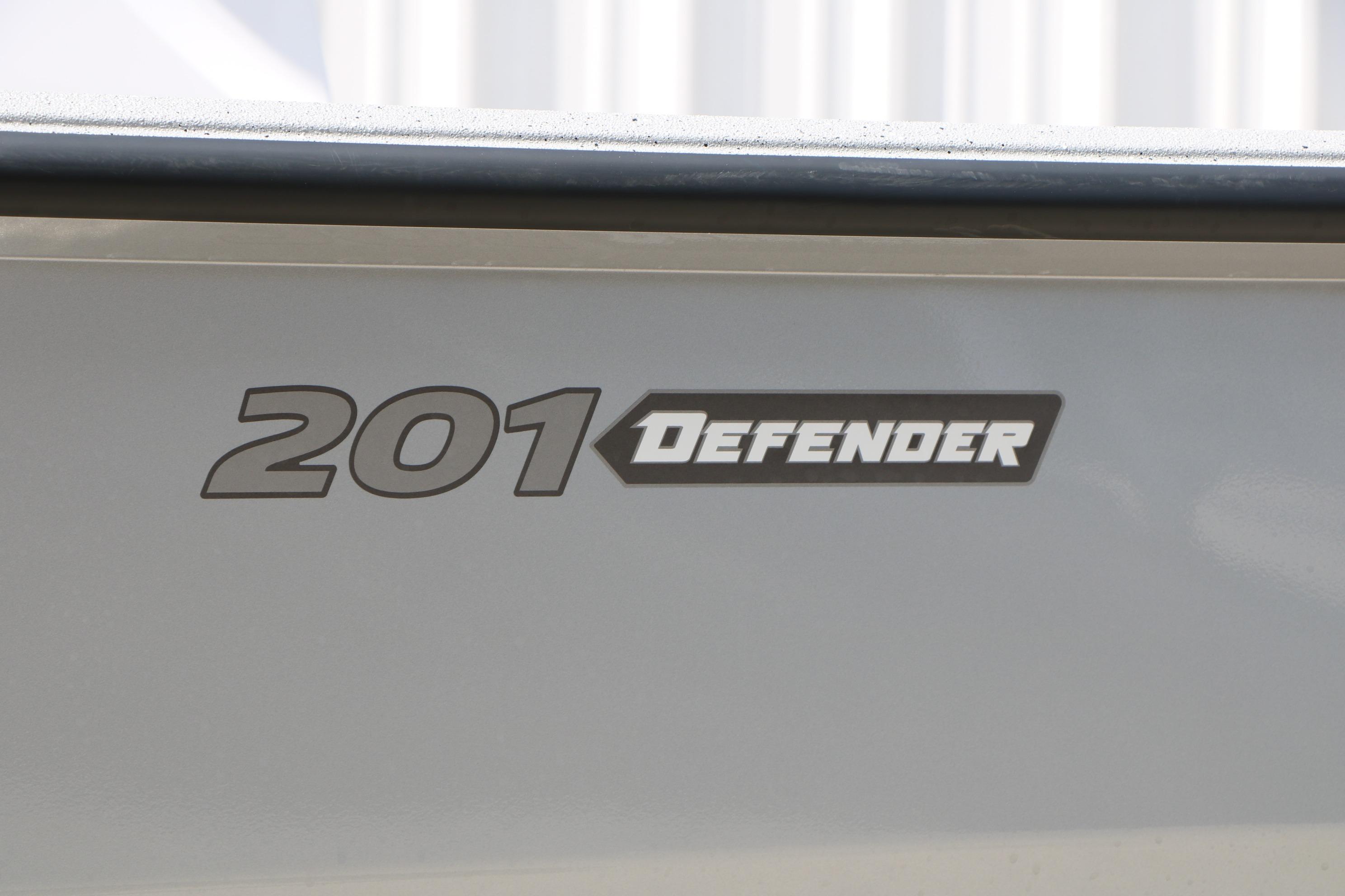 2026 Vexus Defender 201 logo on vehicle exterior.