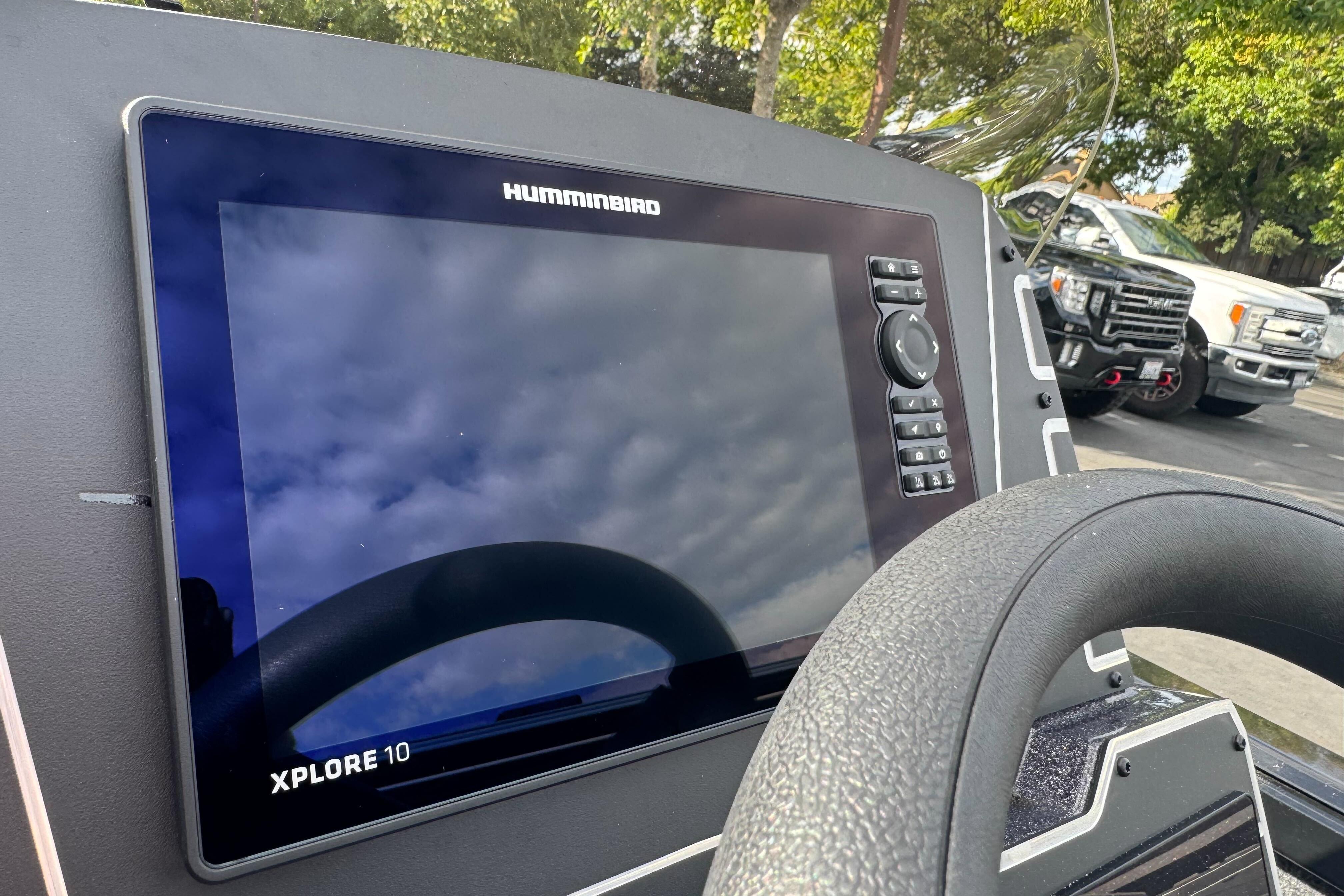 Boat dashboard featuring Humminbird Xplore 10 display, Ranger ALPHA 208, 2026 model.