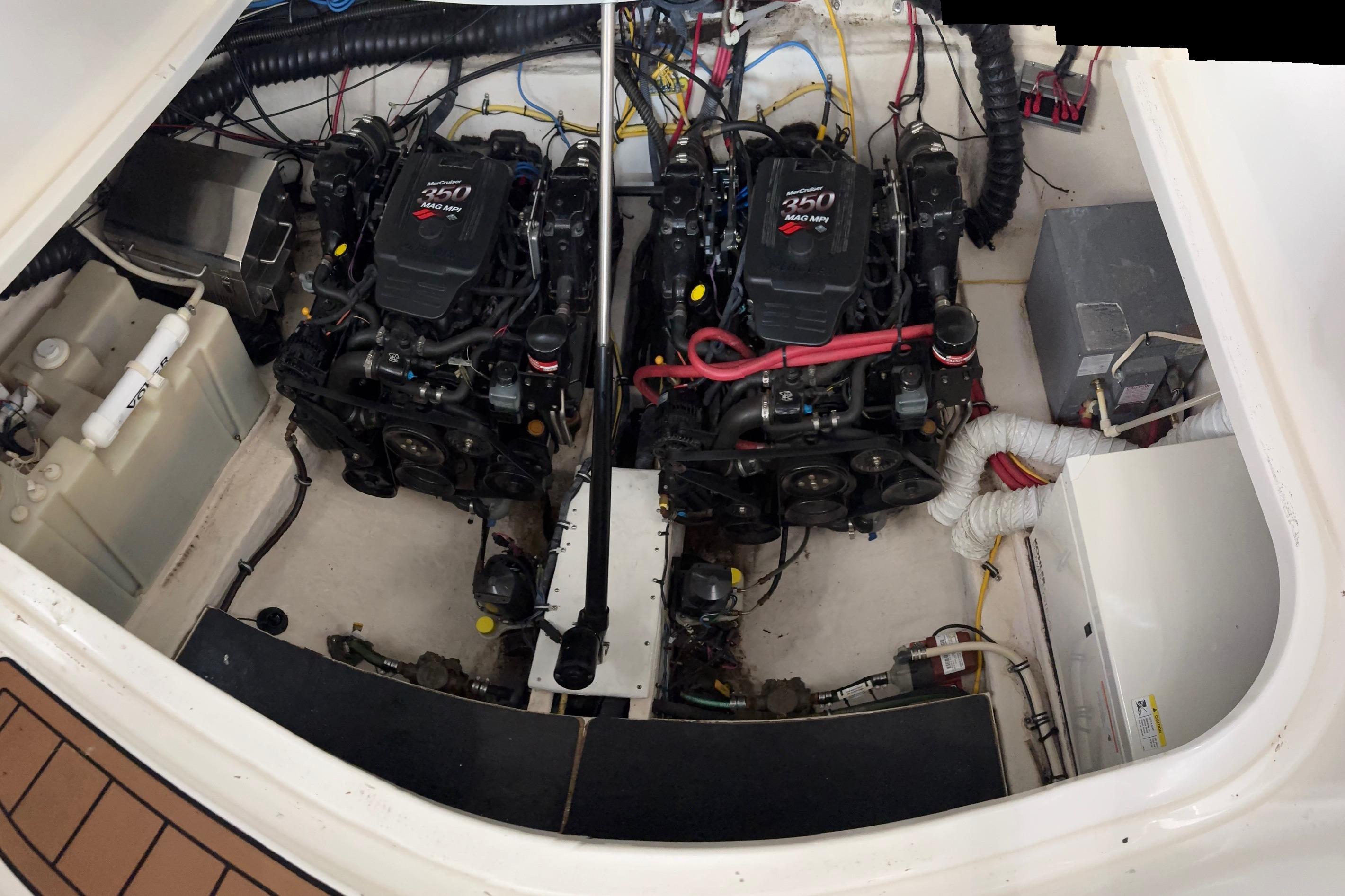 Engine compartment of a 2006 Chaparral 330 Signature boat with dual MerCruiser engines.