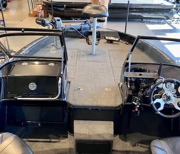 2024 Nitro ZV19 Pro boat interior with steering wheel and seating.
