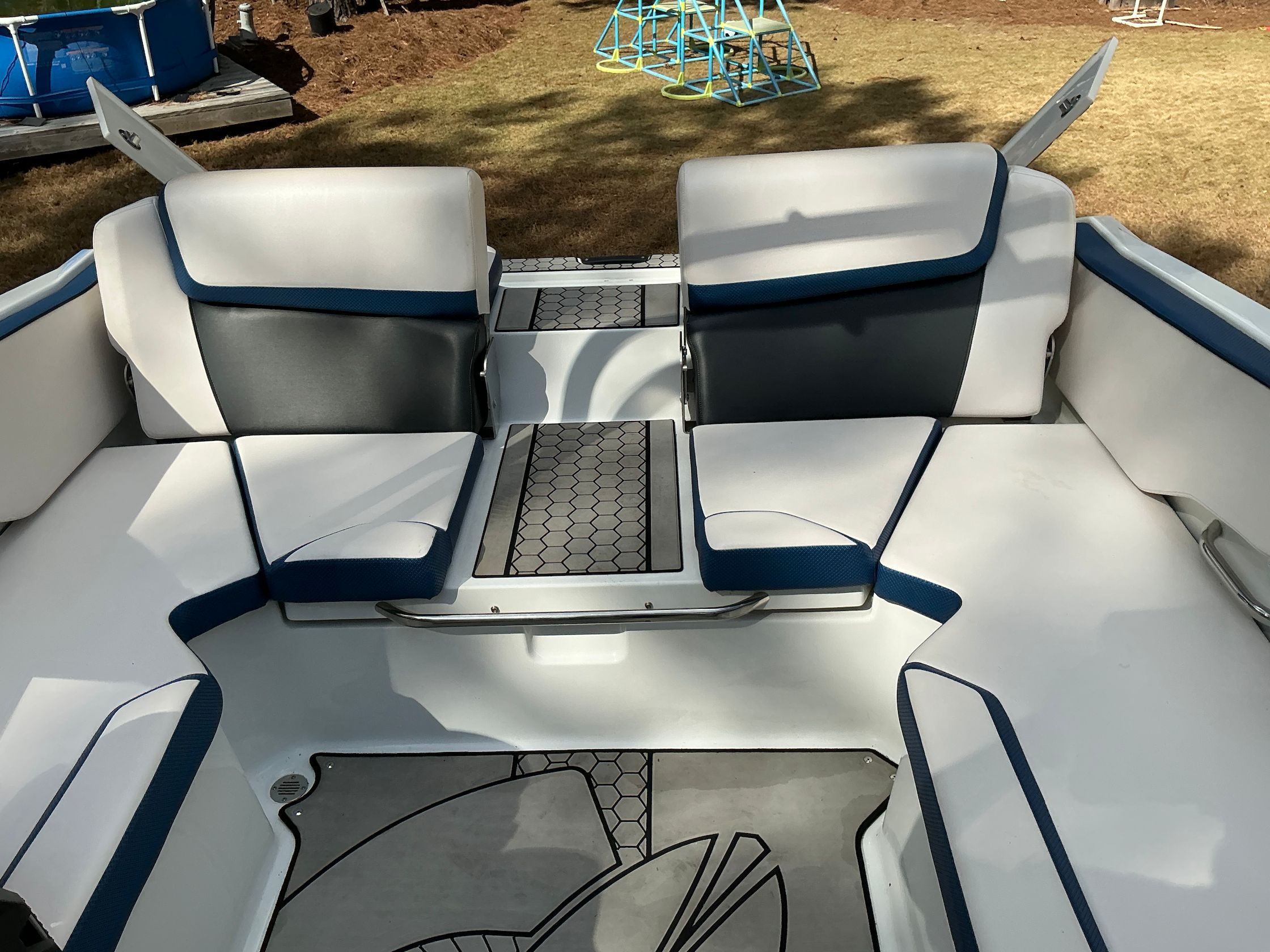 Interior of a 2021 Scarab 215 ID boat with modern seating.