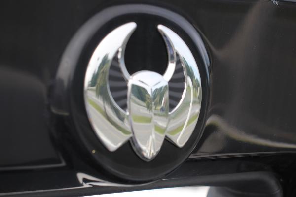 Chrome Scarab logo on 2023 Scarab 255 Open ID boat.