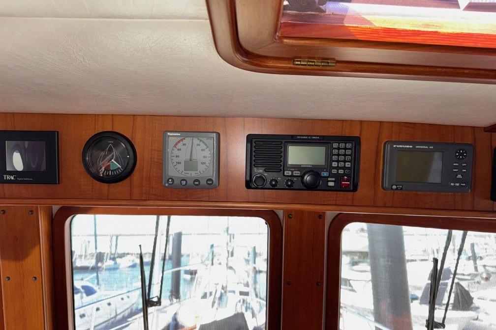 2008 Kadey-Krogen 44 Walk Around yacht dashboard with navigation instruments and controls.