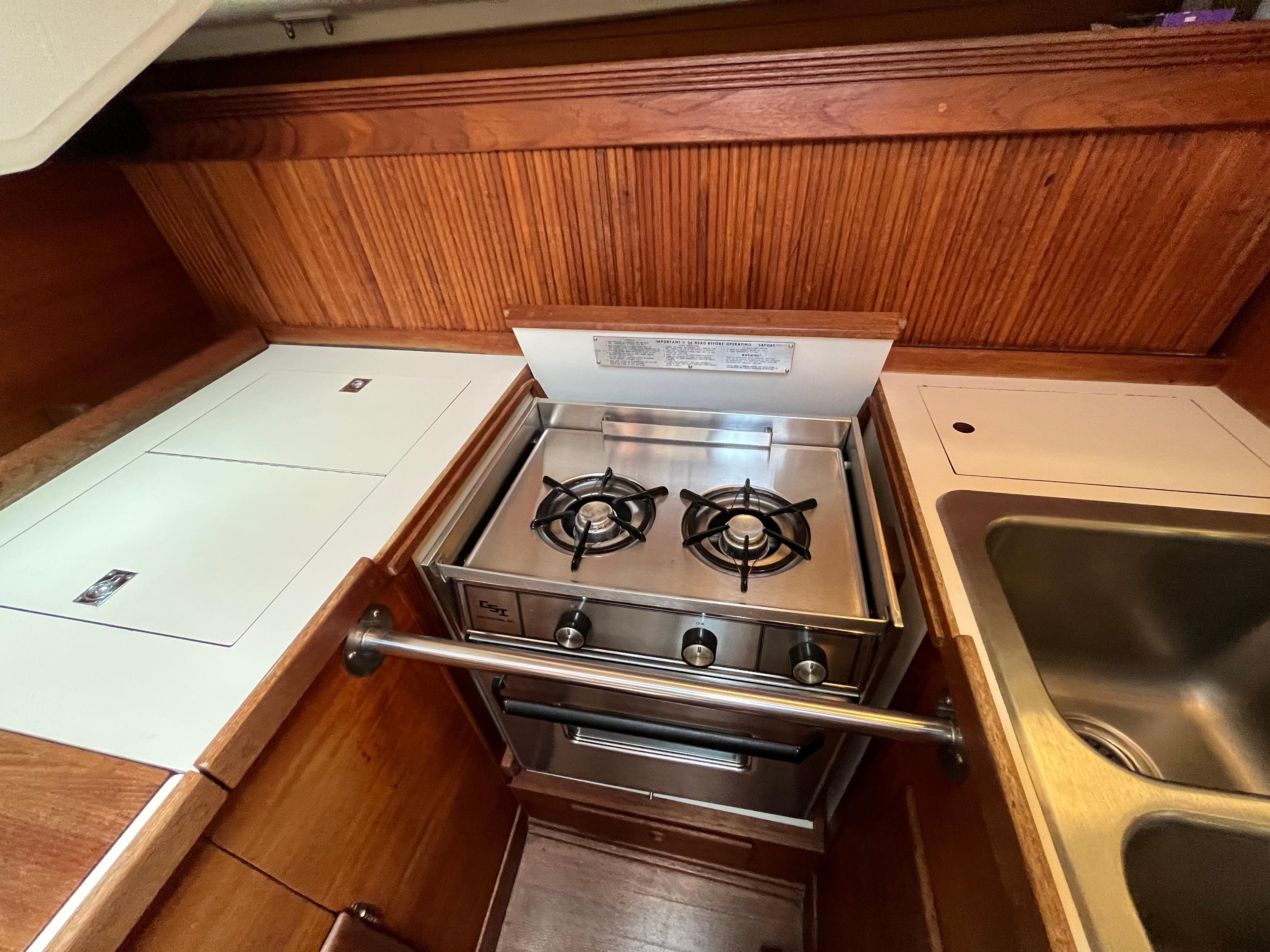 1988 Sabre 34 MK II yacht galley with stove and sink.