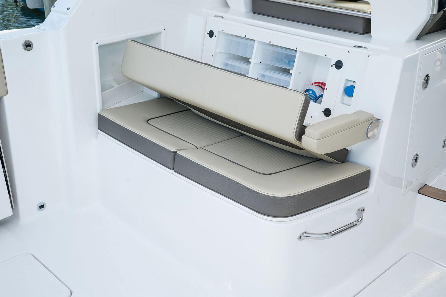 Manufacturer Provided Image: 2025 Pursuit DC 365 Dual Console boat seating with storage compartments.