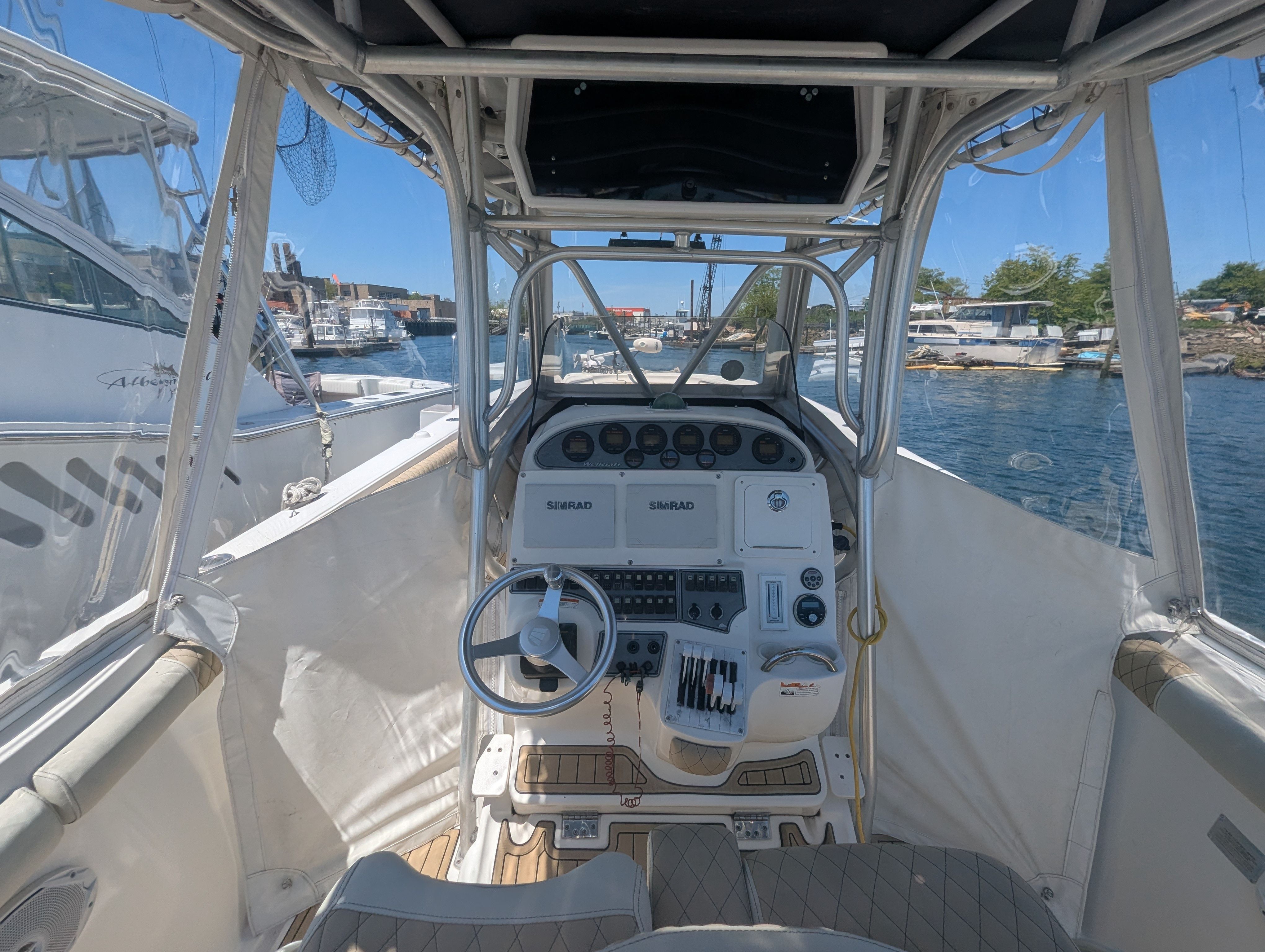 Interior view of a 2005 Wellcraft 35 CCF boat on water.