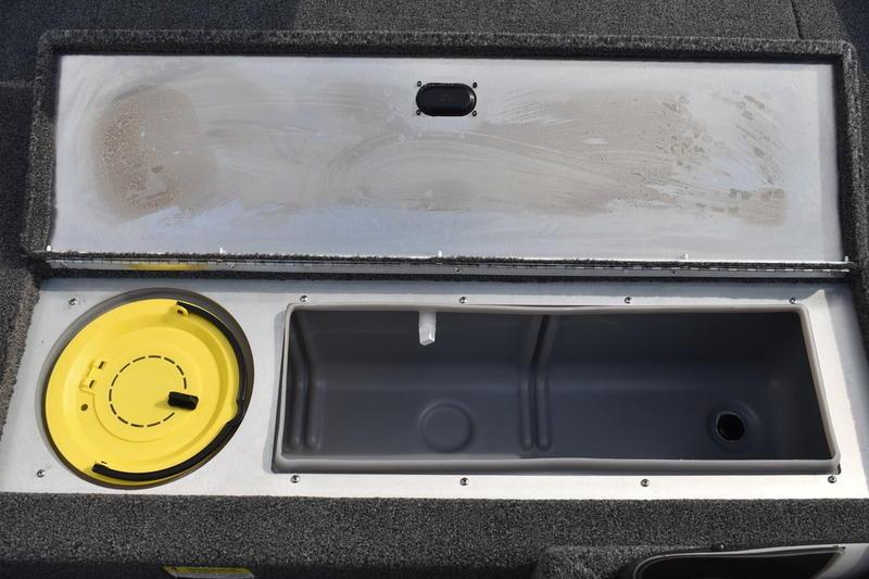 Livewell compartment of 2025 Lowe Skorpion 17 boat, featuring a yellow lid and spacious interior.