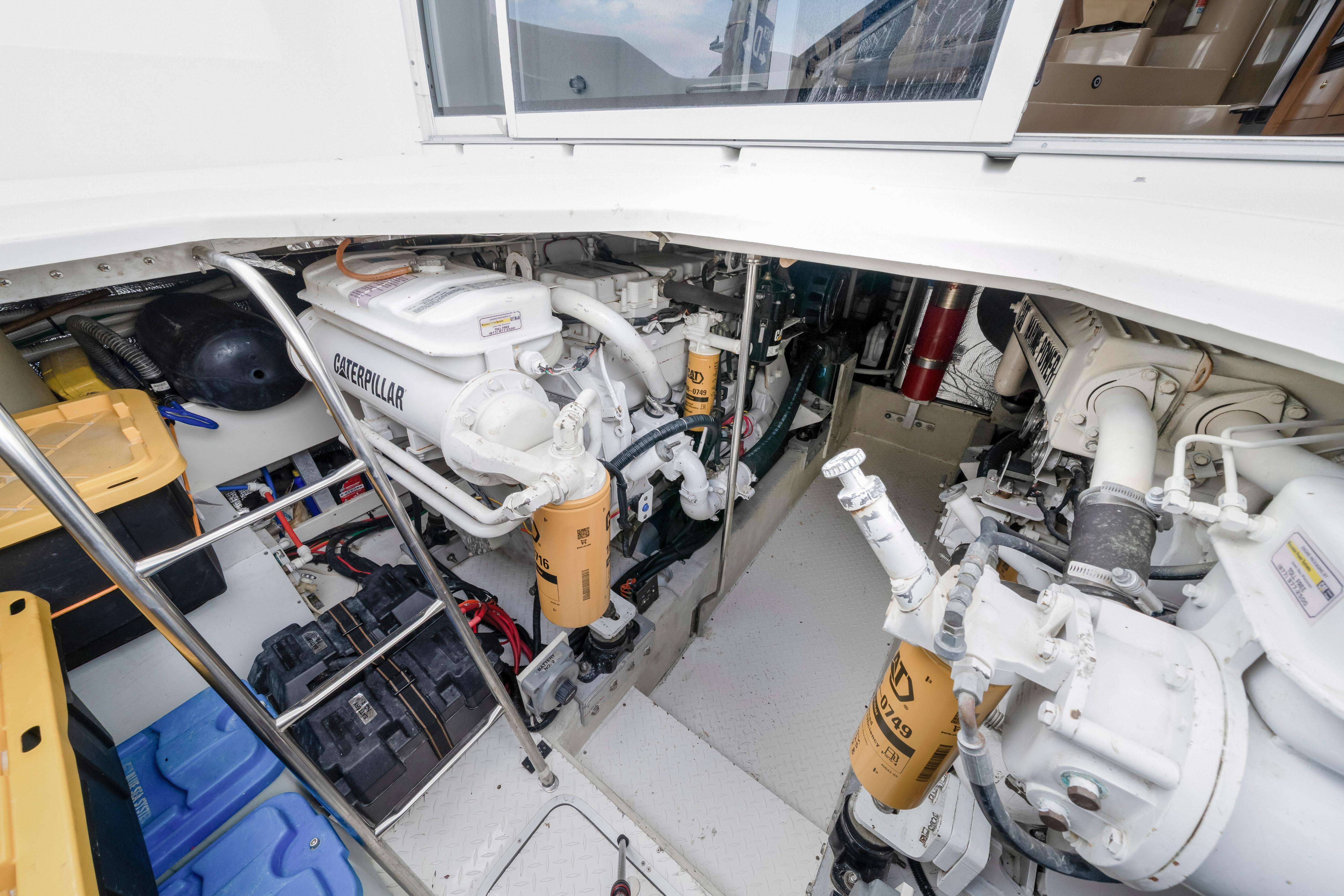 Engine room of 2001 Cruisers Yachts 5000 Sedan Sport with Caterpillar engines.