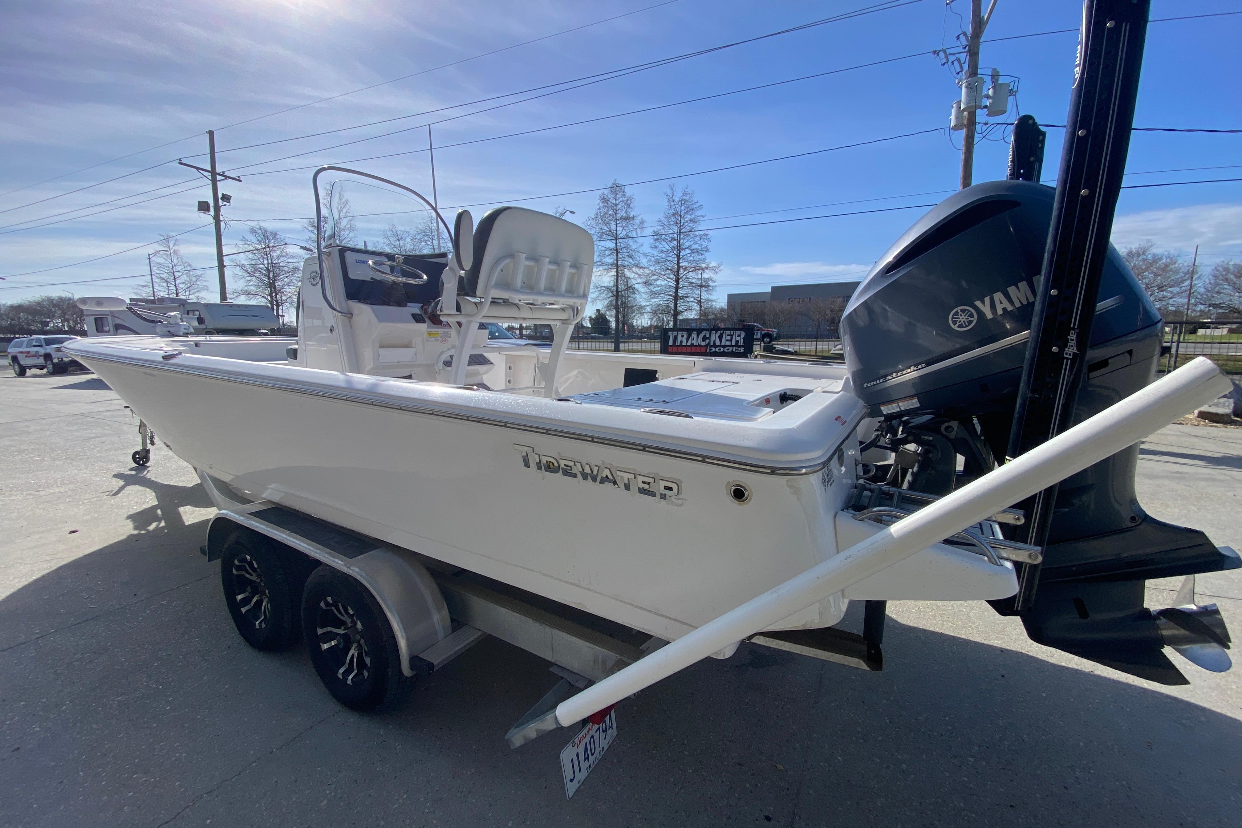 2023 Tidewater 2410 Bay Max boat on trailer with Yamaha outboard motor.