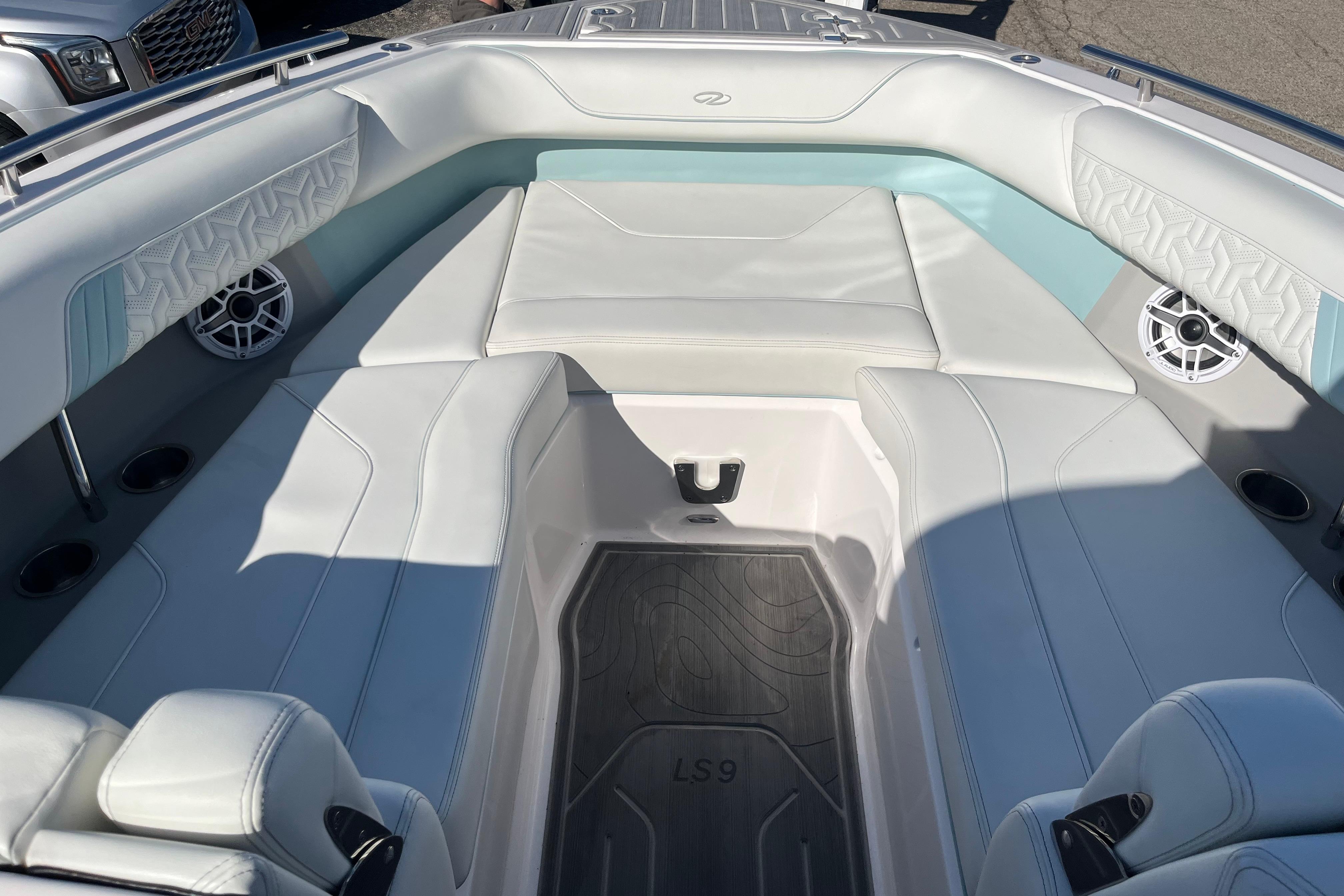 2024 Regal LS9 Surf boat interior with white seating and modern design.