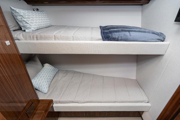 Bunk beds in the 2021 Riviera 5400 Sport Yacht cabin.