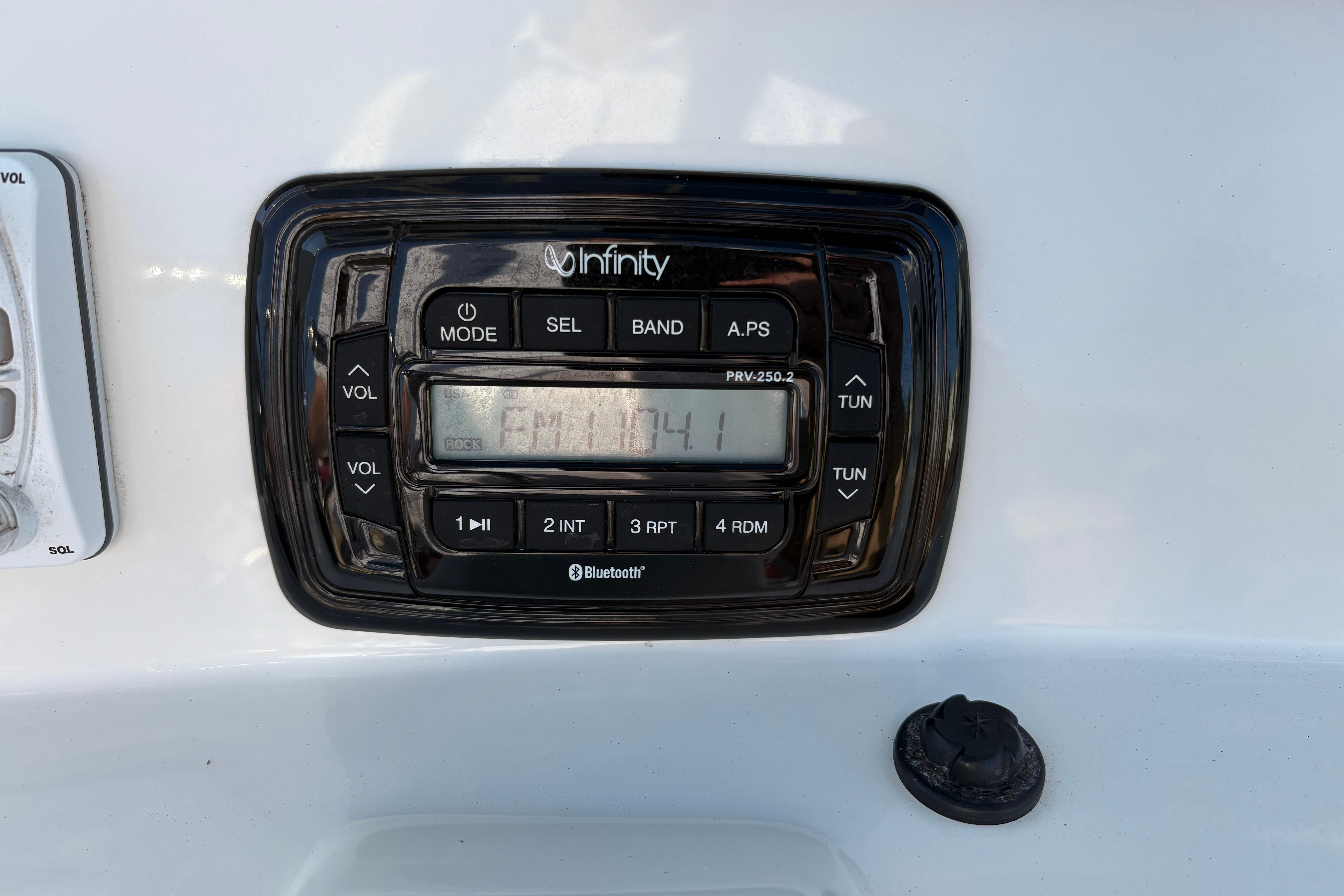 Infinity stereo system on 2019 NauticStar 231 Hybrid boat dashboard.