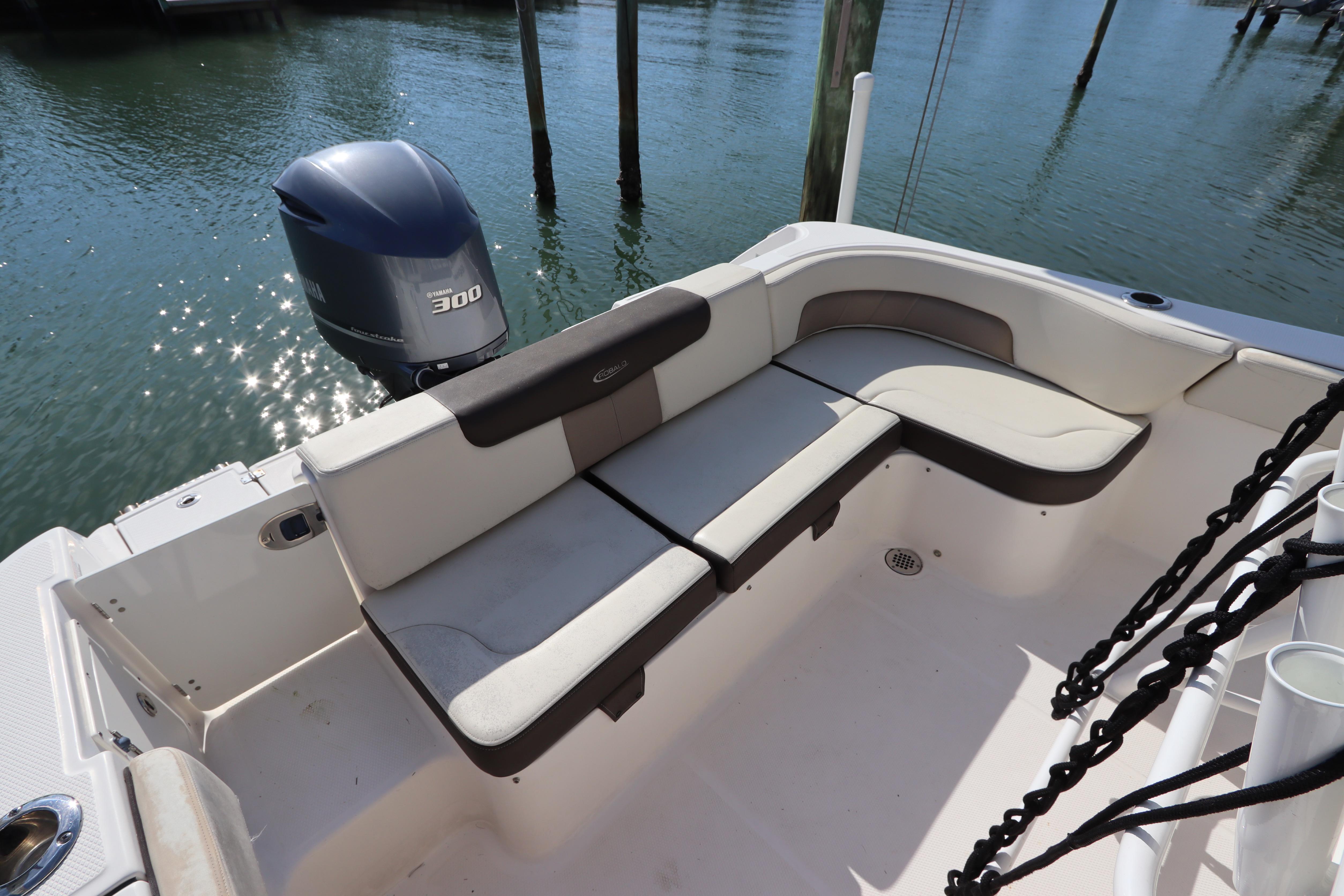 2019 Robalo R242 Center Console boat with Yamaha 300 engine and cushioned seating.