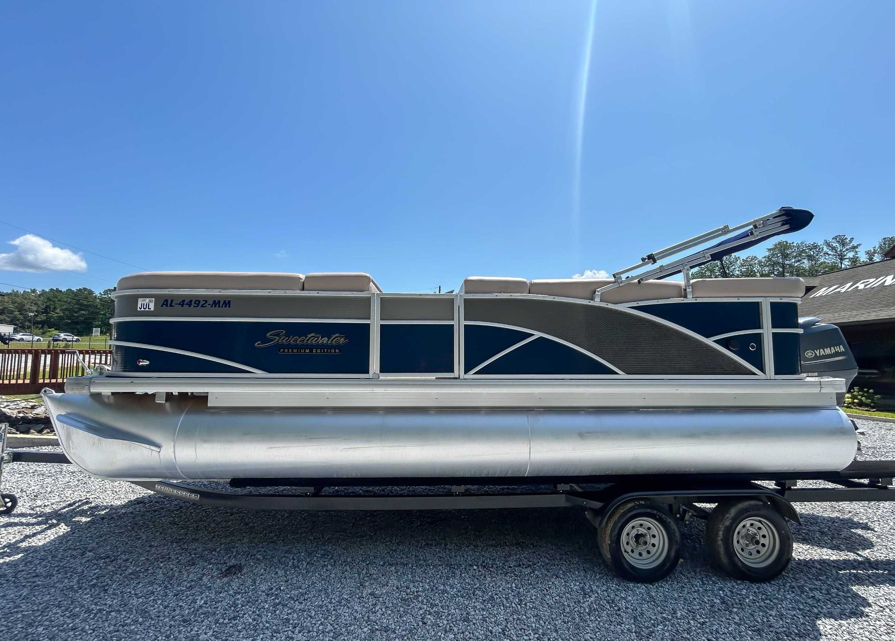 2014 Sweetwater 200 Premium Edition pontoon boat on trailer.