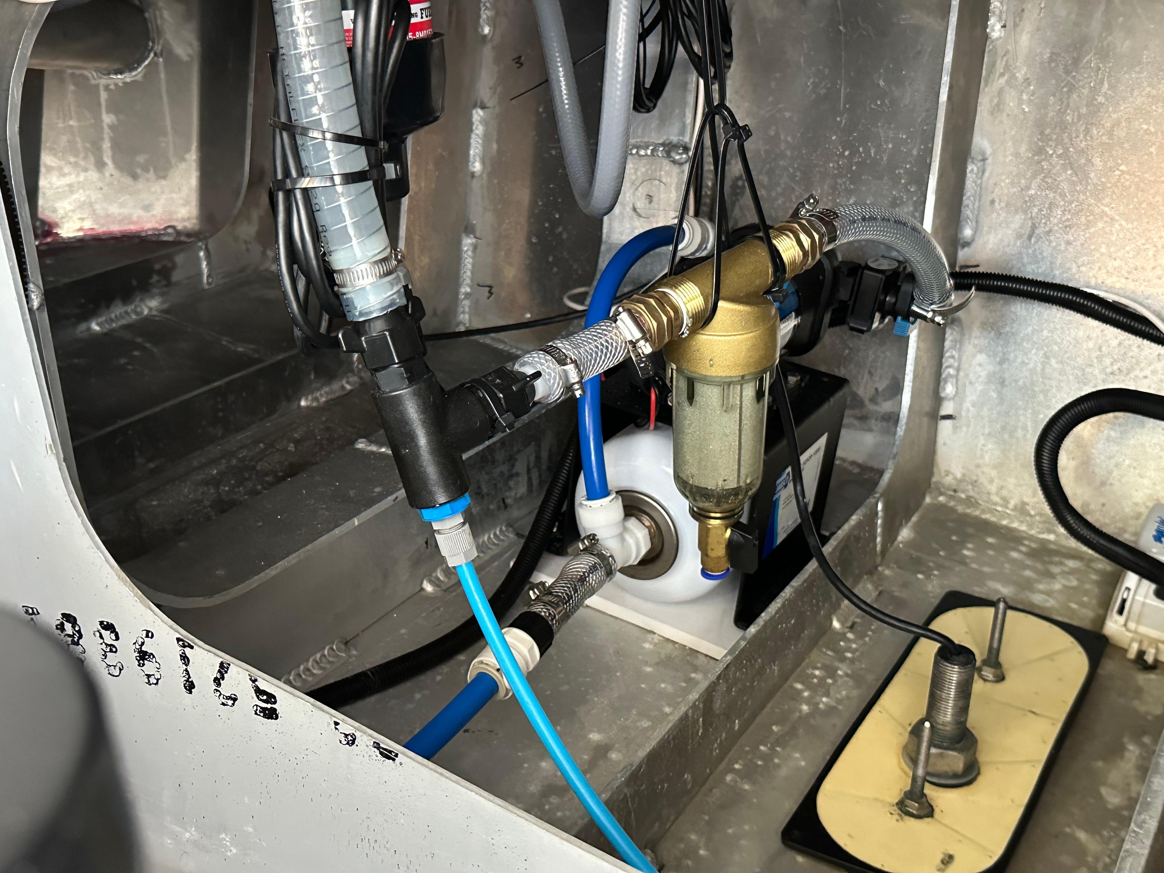 Interior view of 2024 Herley 11 Explorer boat's mechanical components and wiring.