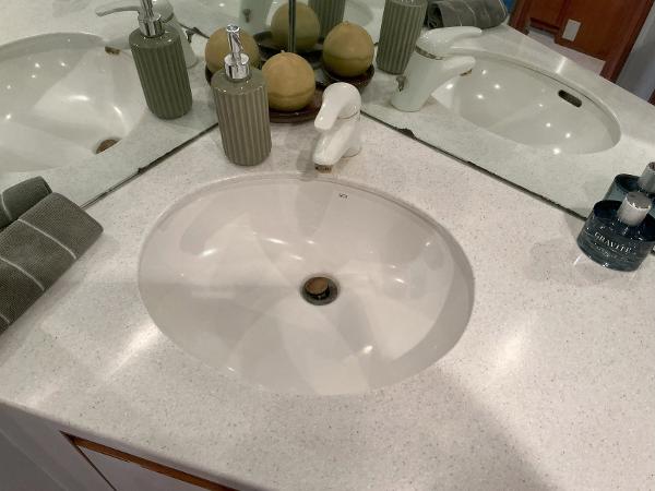 Bathroom sink with modern fixtures on Novatec Islander 55 yacht, 2000 model.